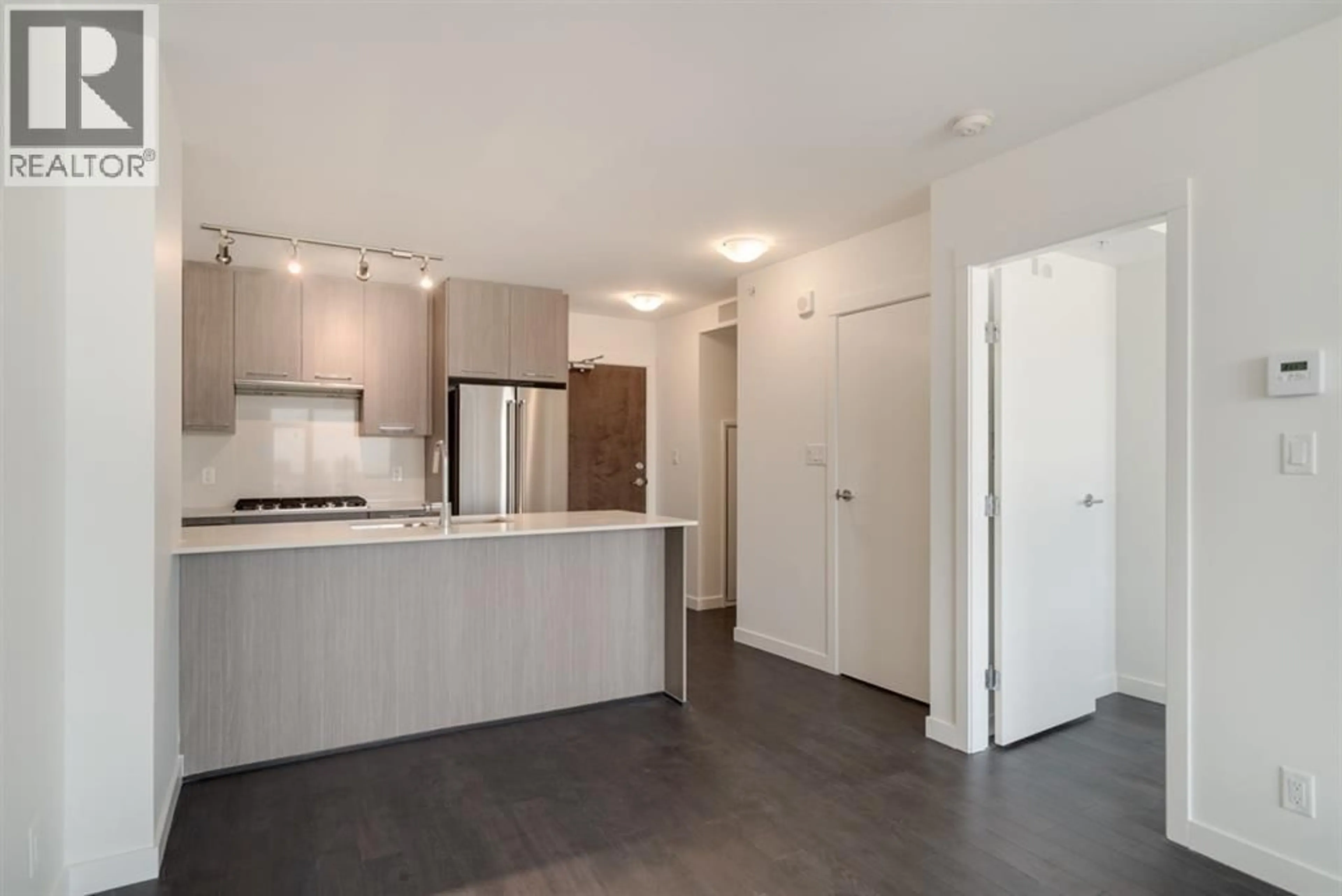 Open concept kitchen, unknown for 703 - 5619 CEDARBRIDGE WAY, Richmond British Columbia V6X0P8