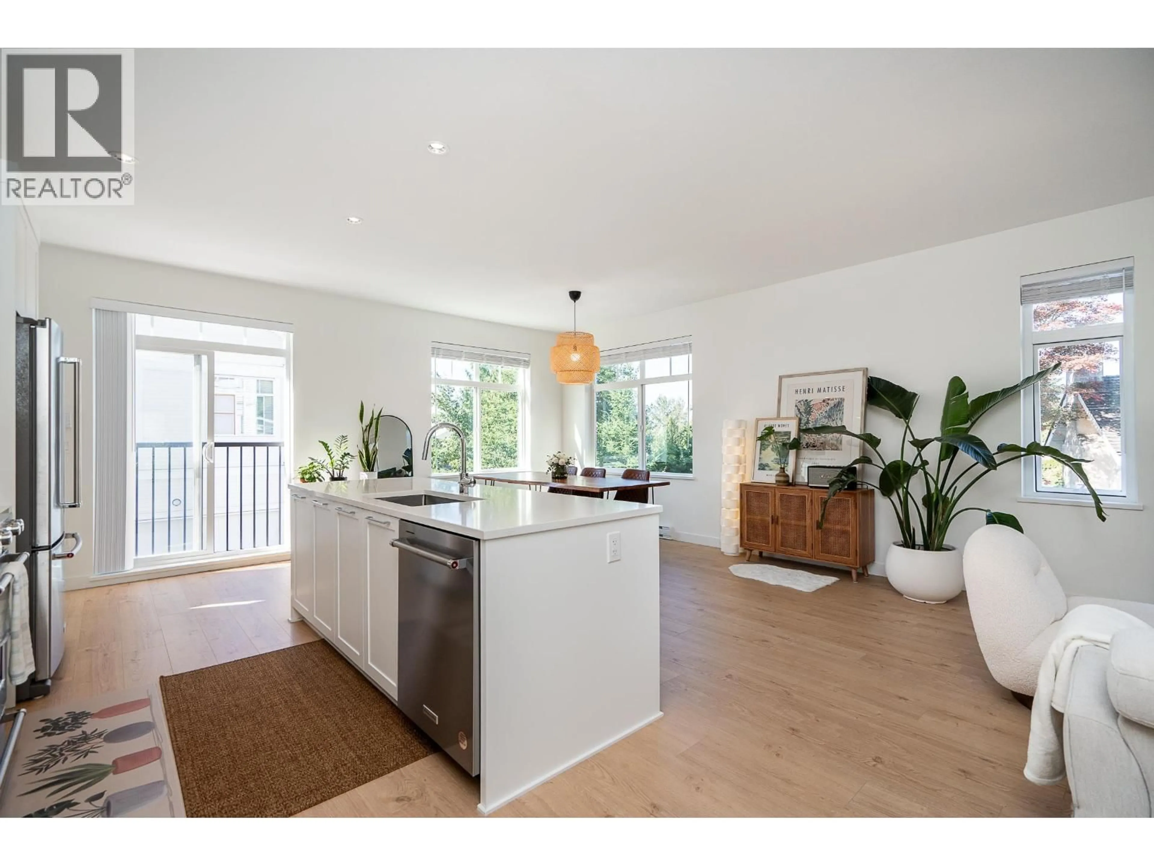 Open concept kitchen, wood/laminate floor for 110 - 3489 BAYCREST AVENUE, Coquitlam British Columbia V3B0T4