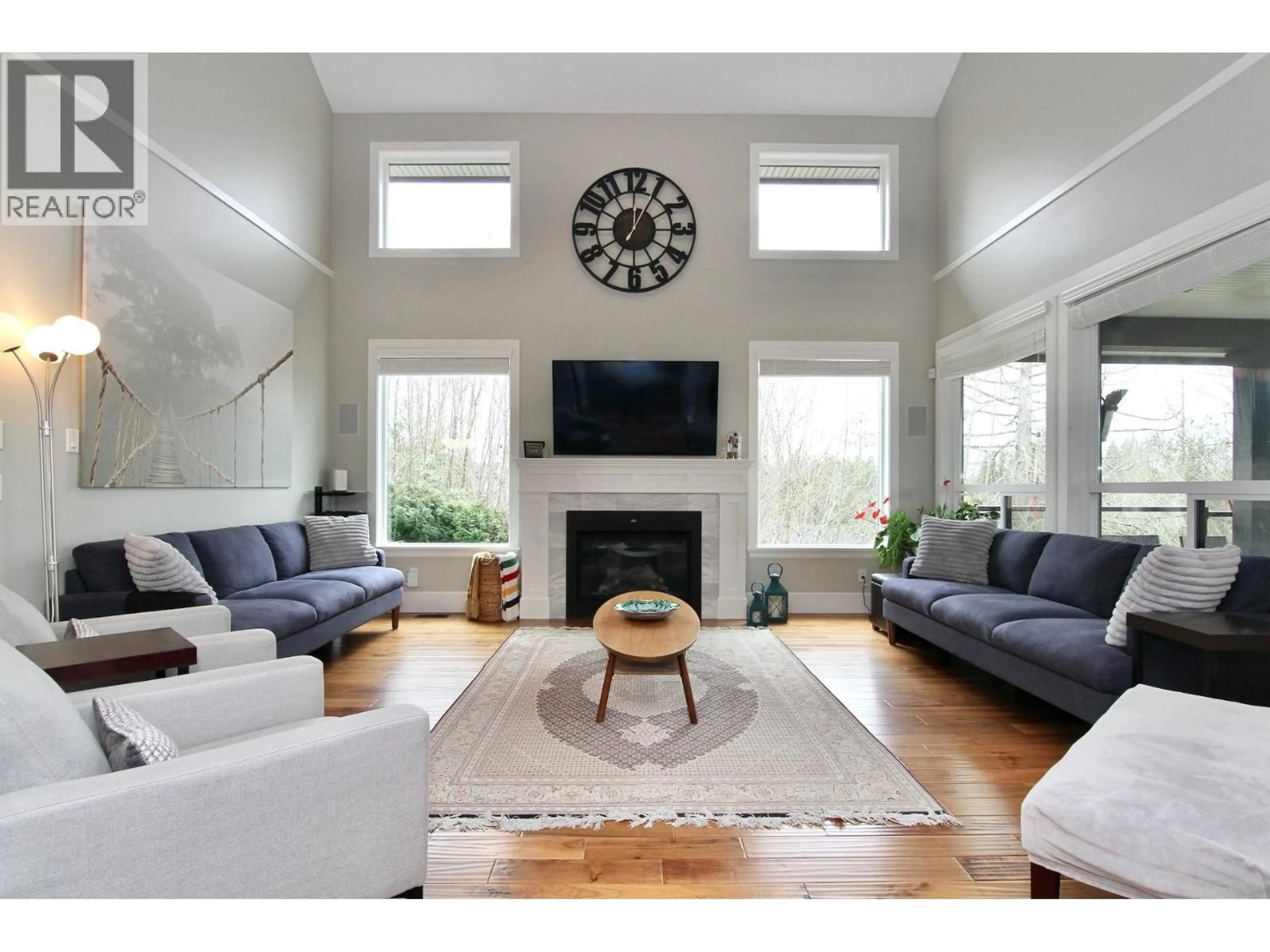 Living room with furniture, wood/laminate floor for 13605 MCKERCHER DRIVE, Maple Ridge British Columbia V4R0E1
