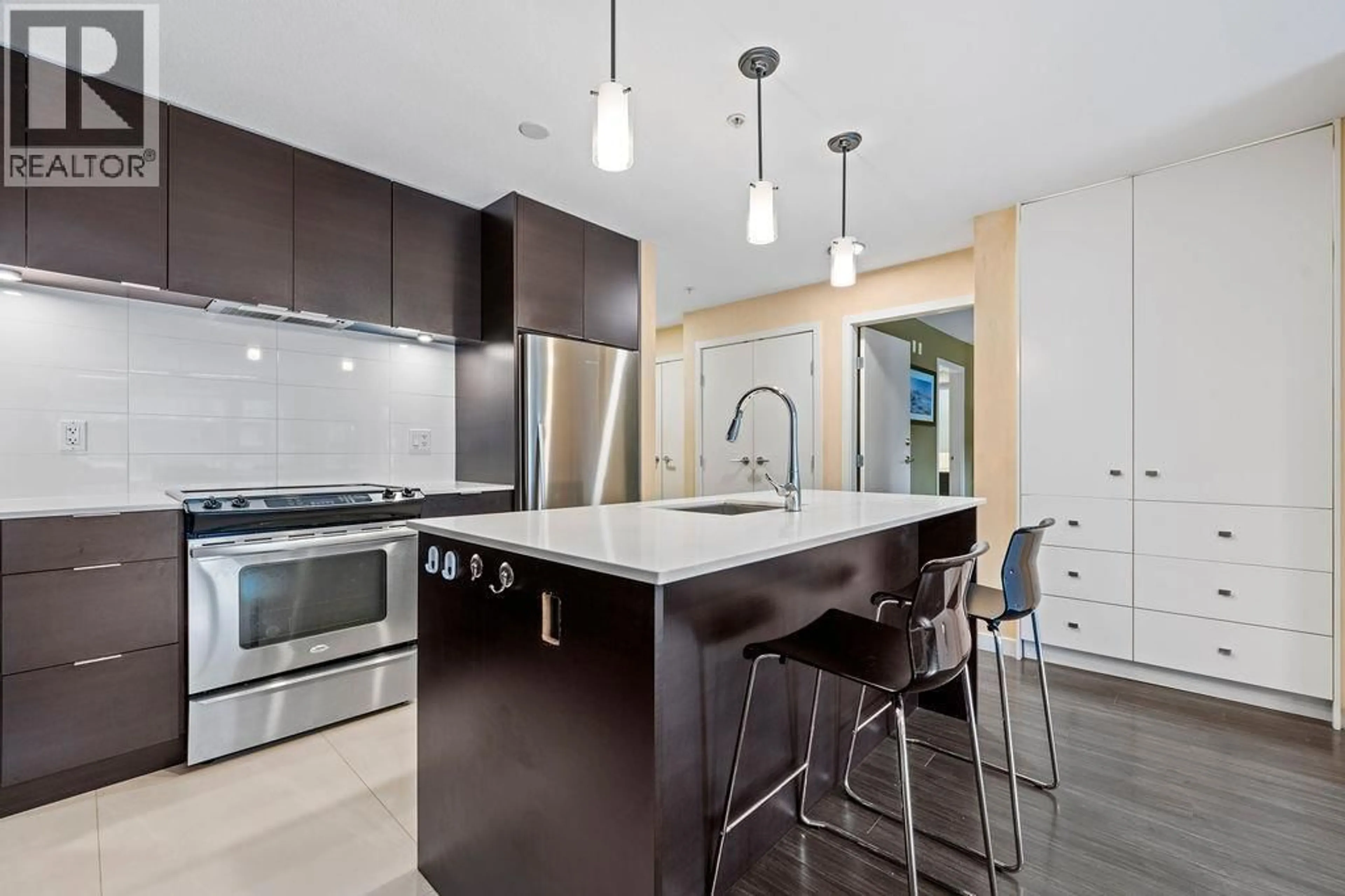 Contemporary kitchen, ceramic/tile floor for 312 - 1679 LLOYD AVENUE, Vancouver British Columbia V7P0A9