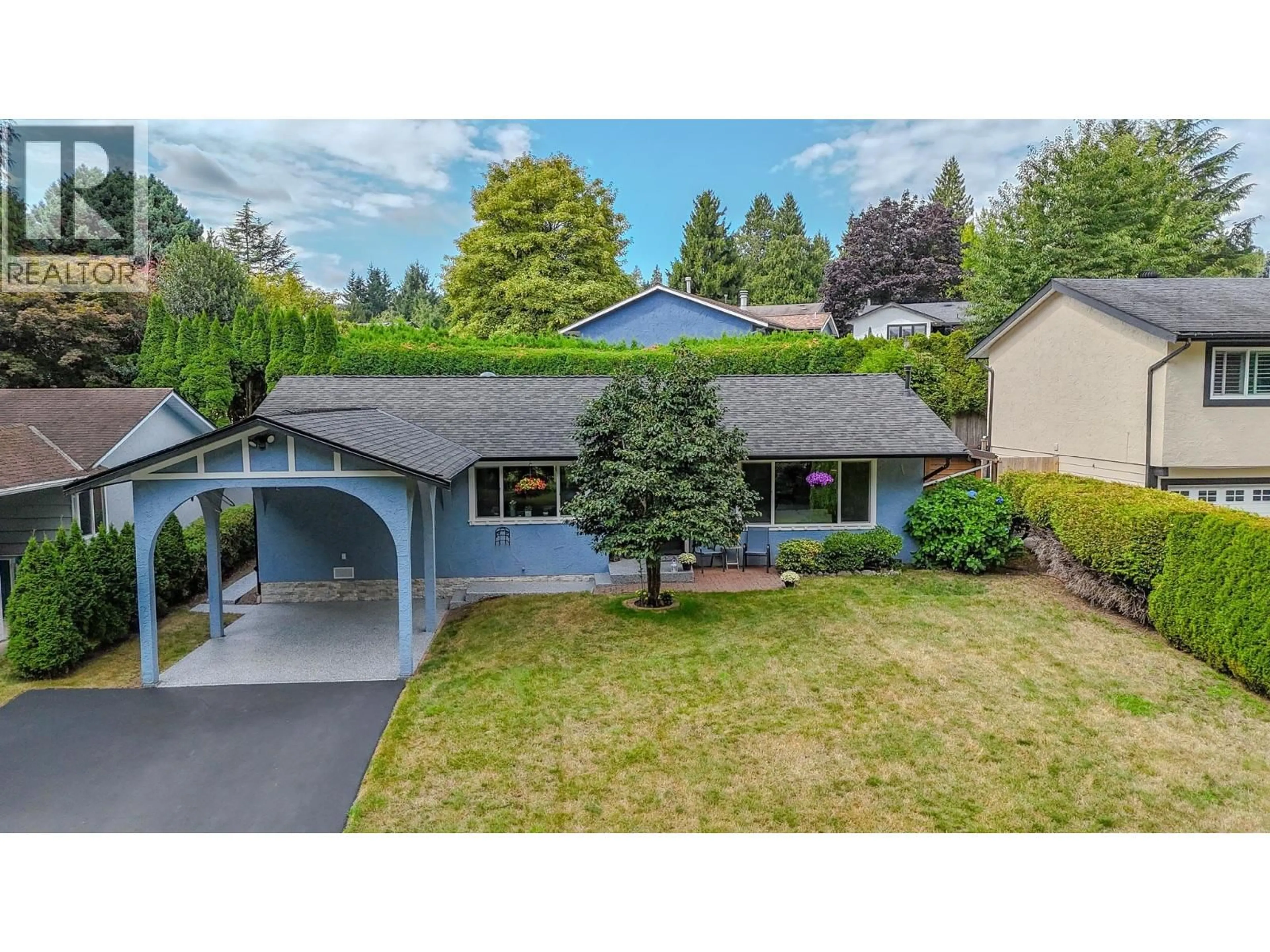 Home with vinyl exterior material, street for 1674 CONNAUGHT DRIVE, Port Coquitlam British Columbia V3C4G8