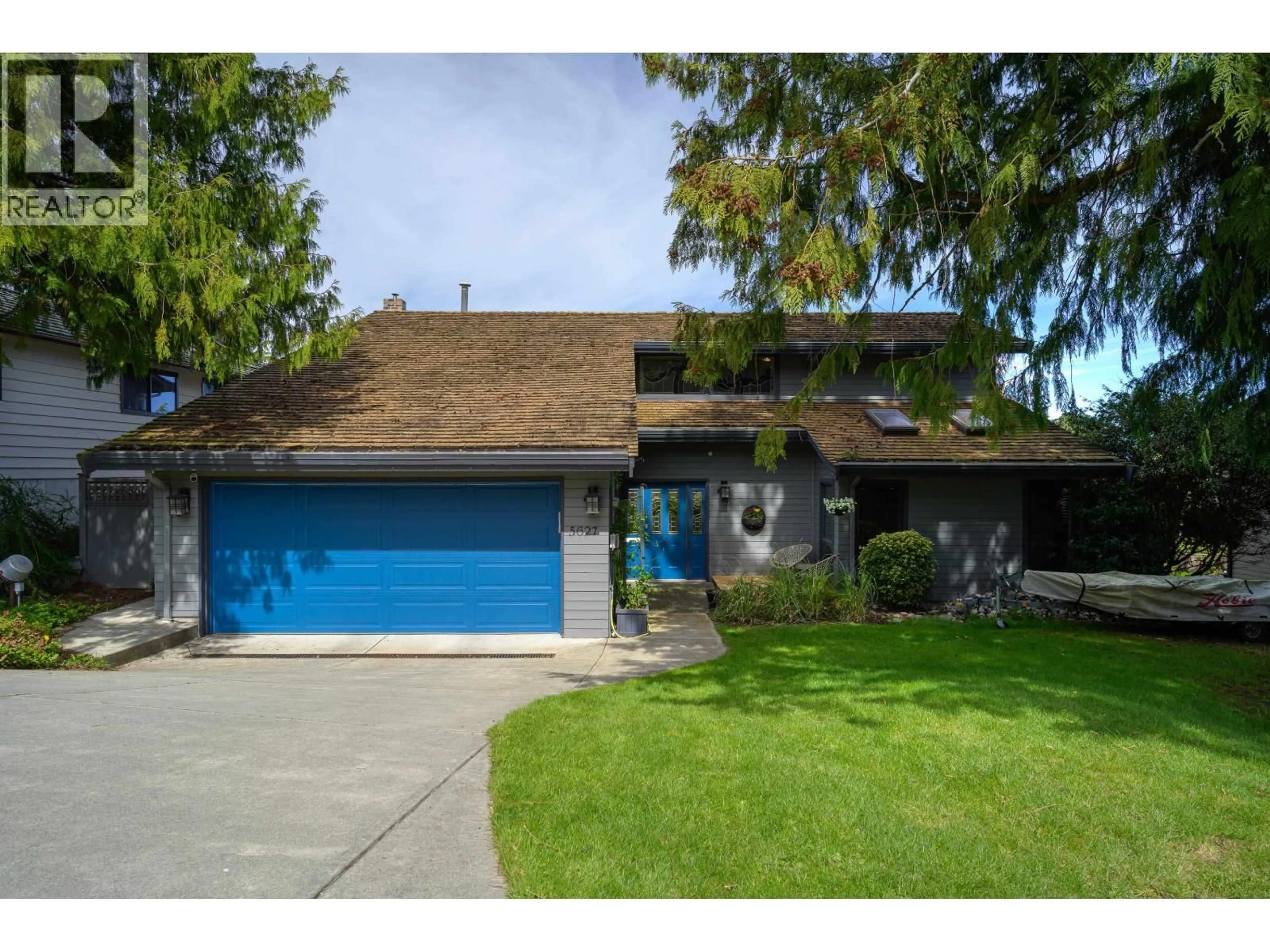 Home with vinyl exterior material, street for 5627 TIMBERVALLEY ROAD, Delta British Columbia V4L2E7