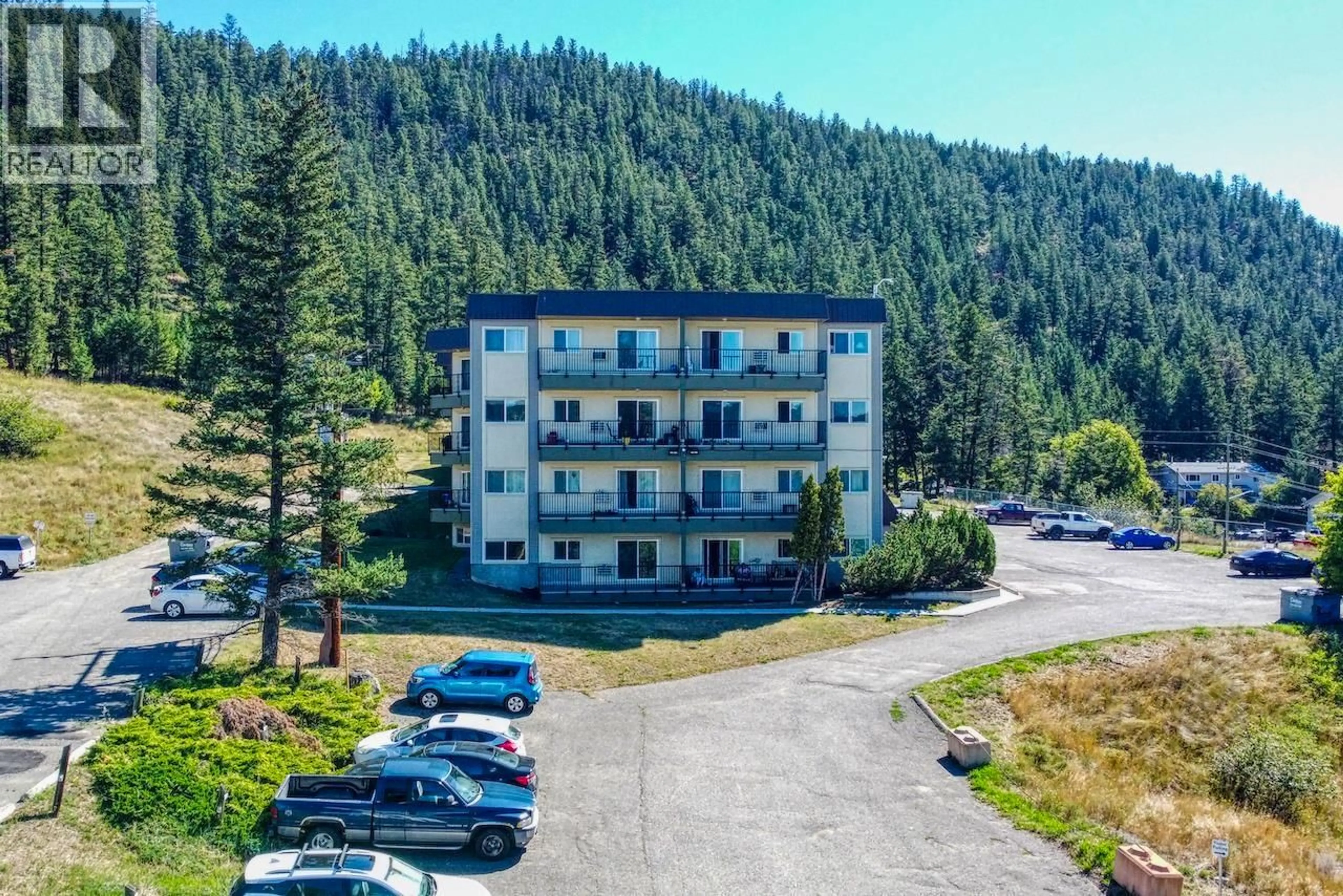 A pic from outside/outdoor area/front of a property/back of a property/a pic from drone, mountain view for 413 - 280 BROADWAY AVENUE, Williams Lake British Columbia V2G4J7
