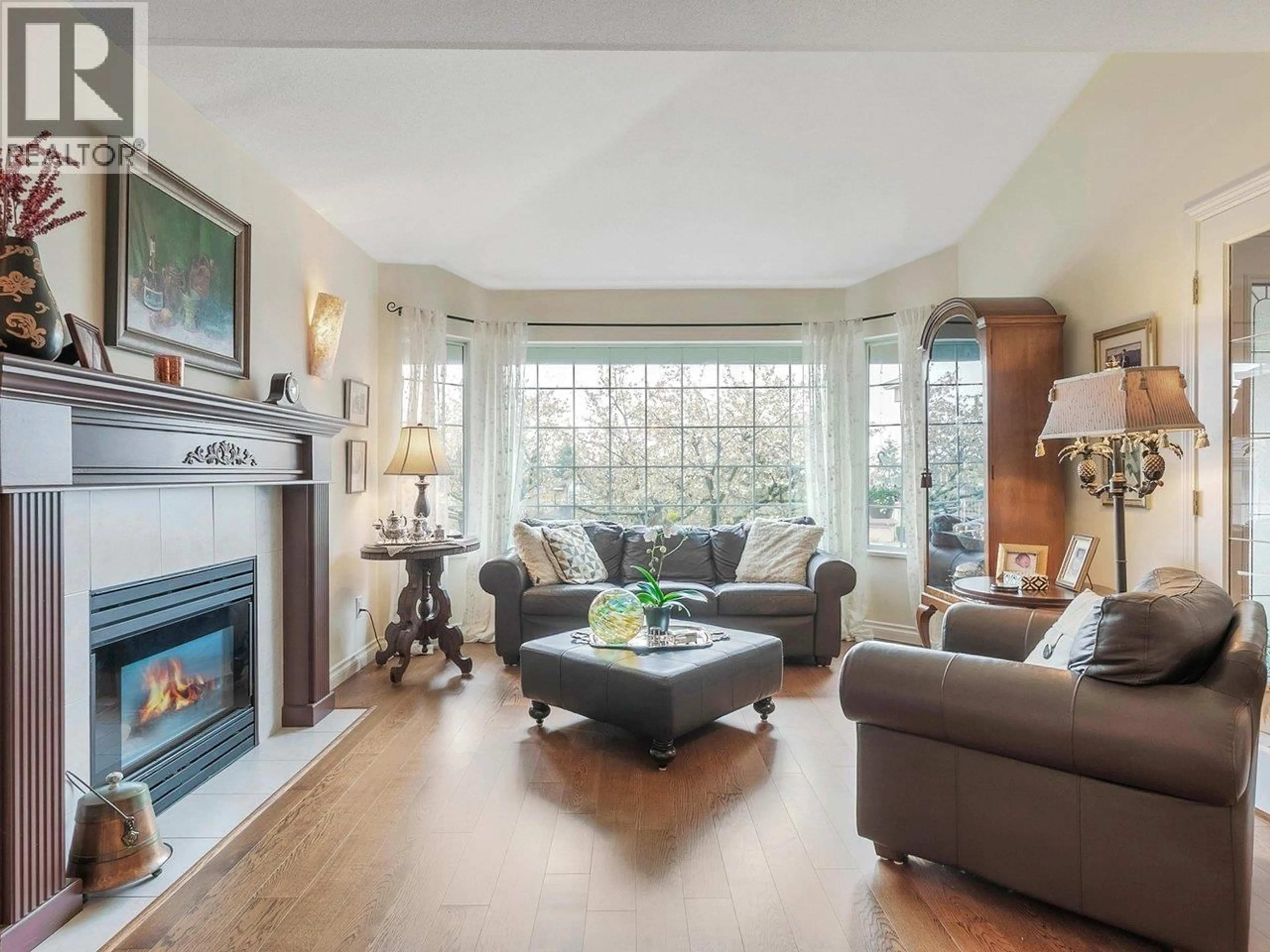 Living room with furniture, wood/laminate floor for 2817 GREENBRIER PLACE, Coquitlam British Columbia V3E2S4