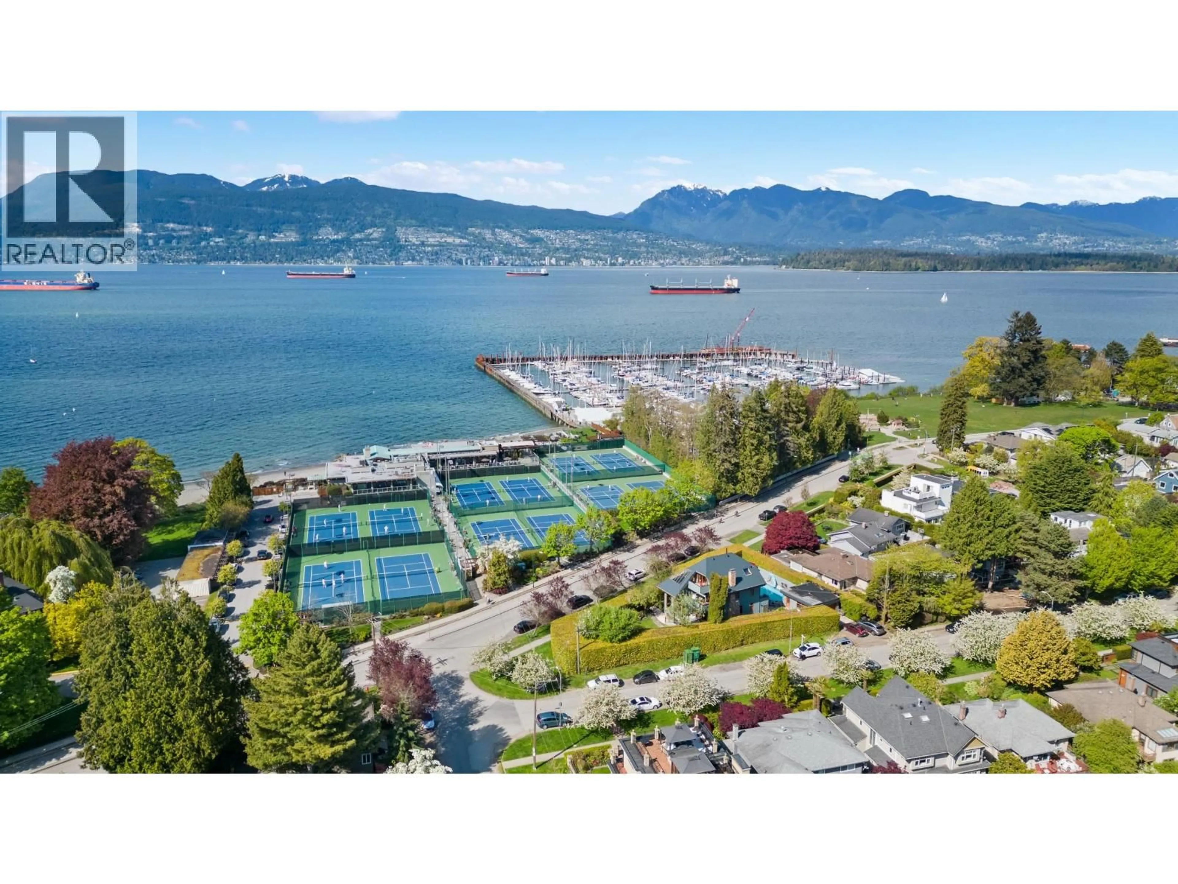 A pic from outside/outdoor area/front of a property/back of a property/a pic from drone, water/lake/river/ocean view for 3850 POINT GREY ROAD, Vancouver British Columbia V6R1B4