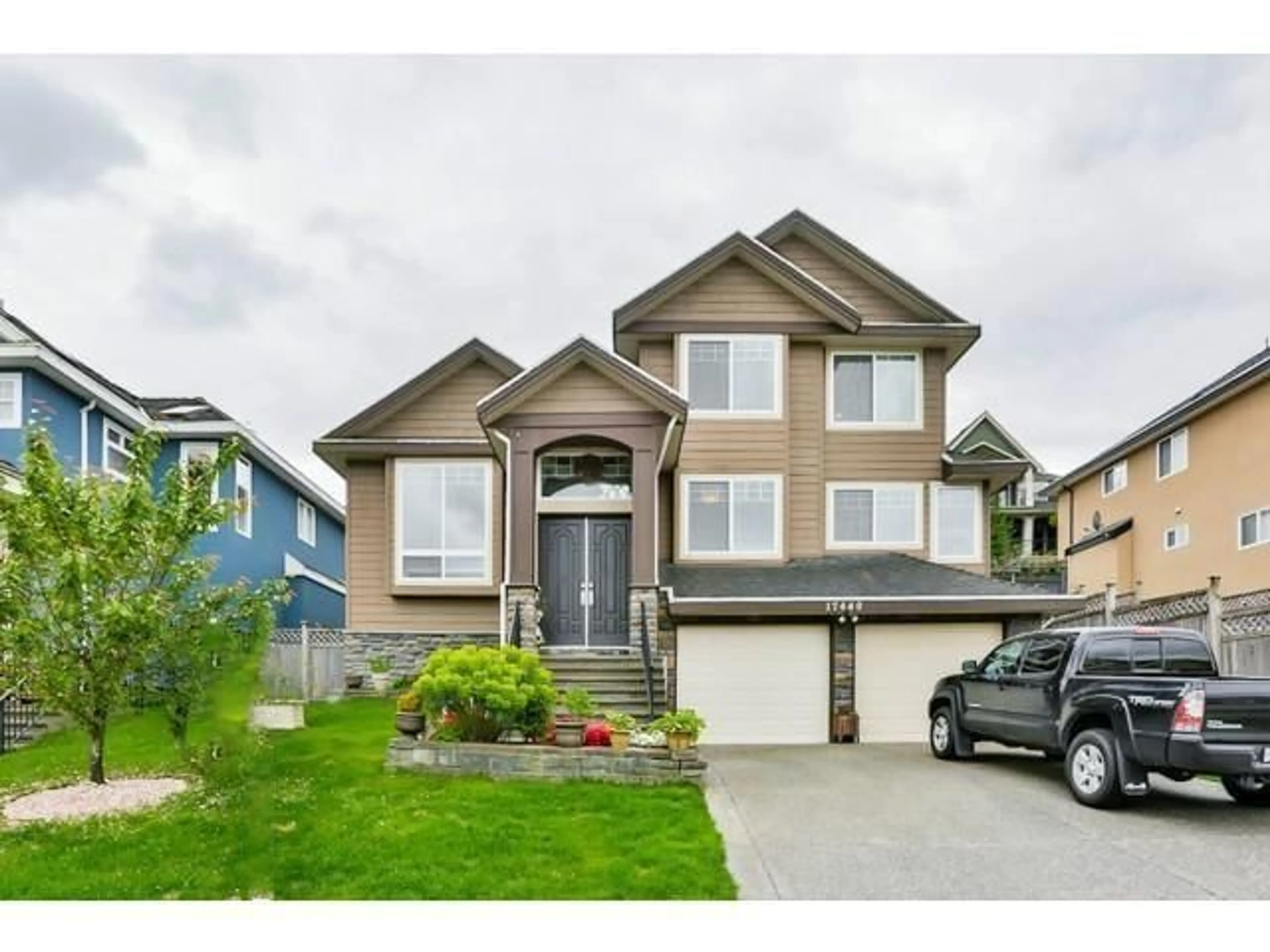 Home with vinyl exterior material, street for 17440 103B, Surrey British Columbia V4N5R4