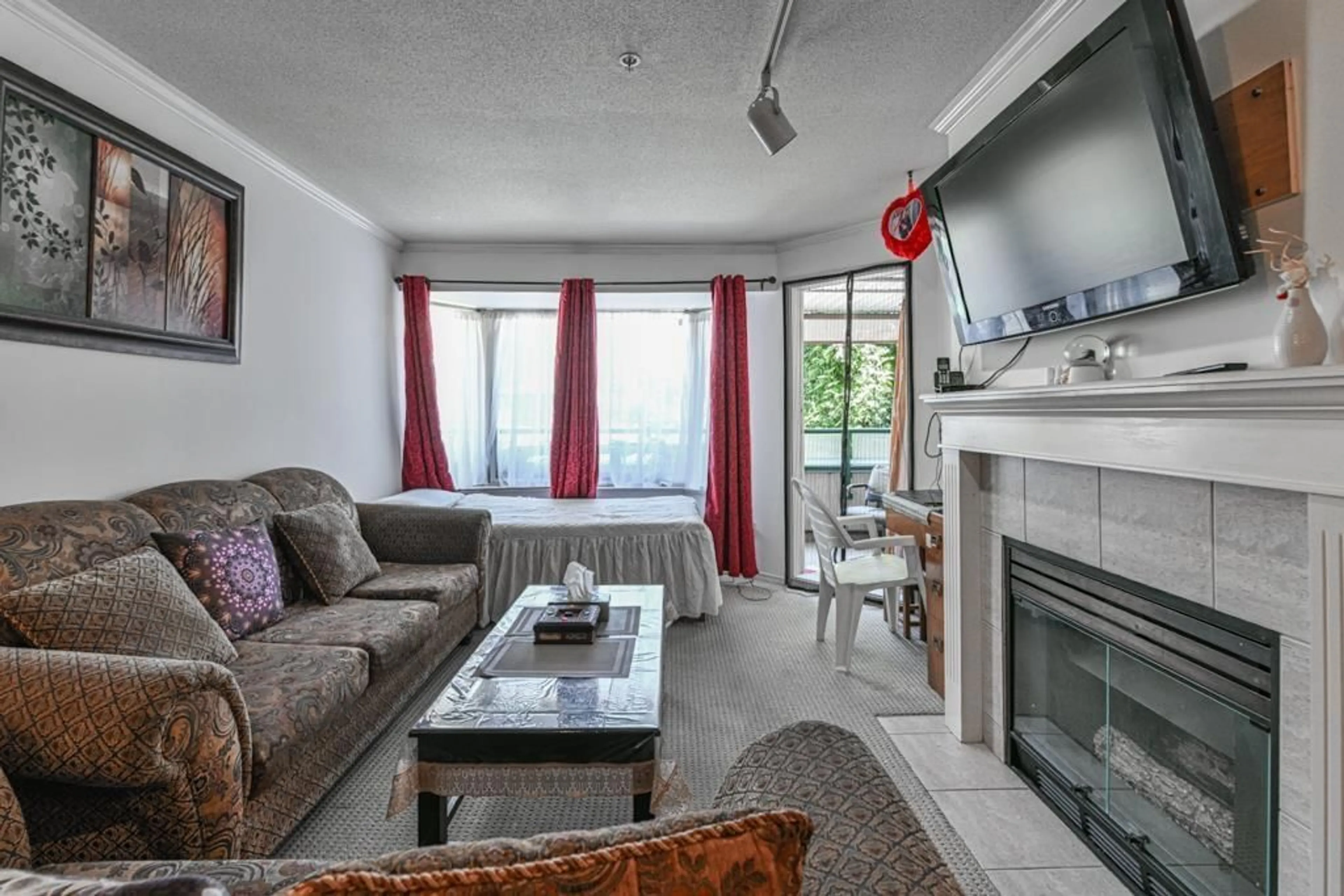 Living room with furniture, unknown for 208 - 2960 TRETHEWEY, Abbotsford British Columbia V2T6P5