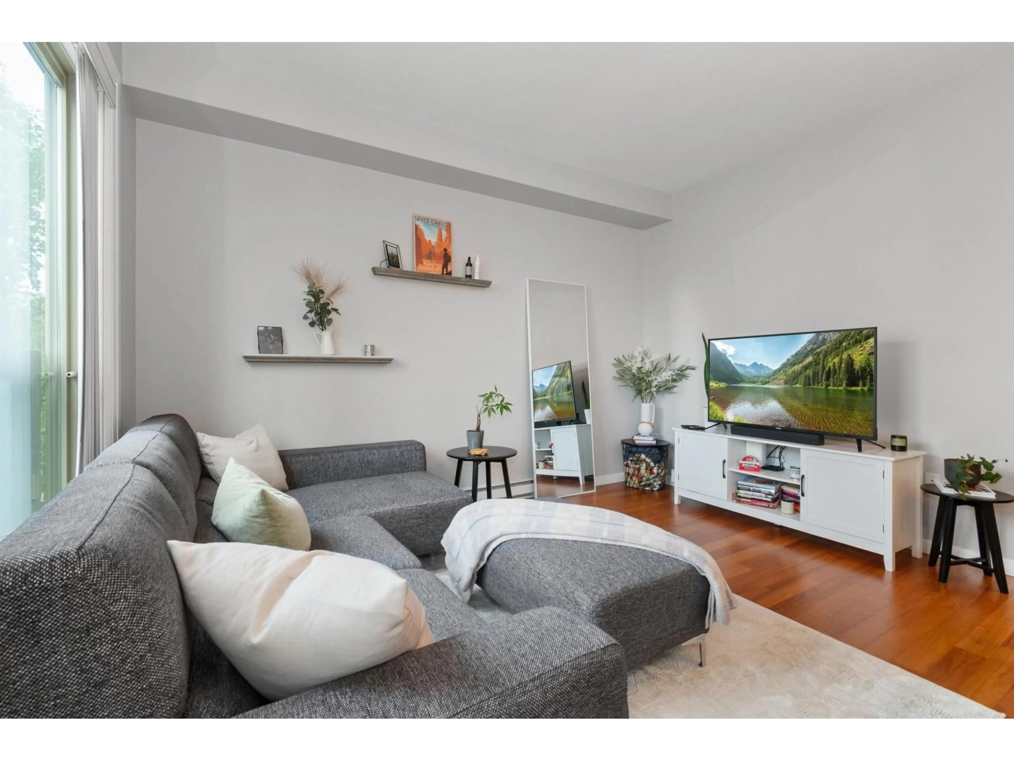 Living room with furniture, wood/laminate floor for 310 - 45530 MARKET WAY, Chilliwack British Columbia V2R0M5