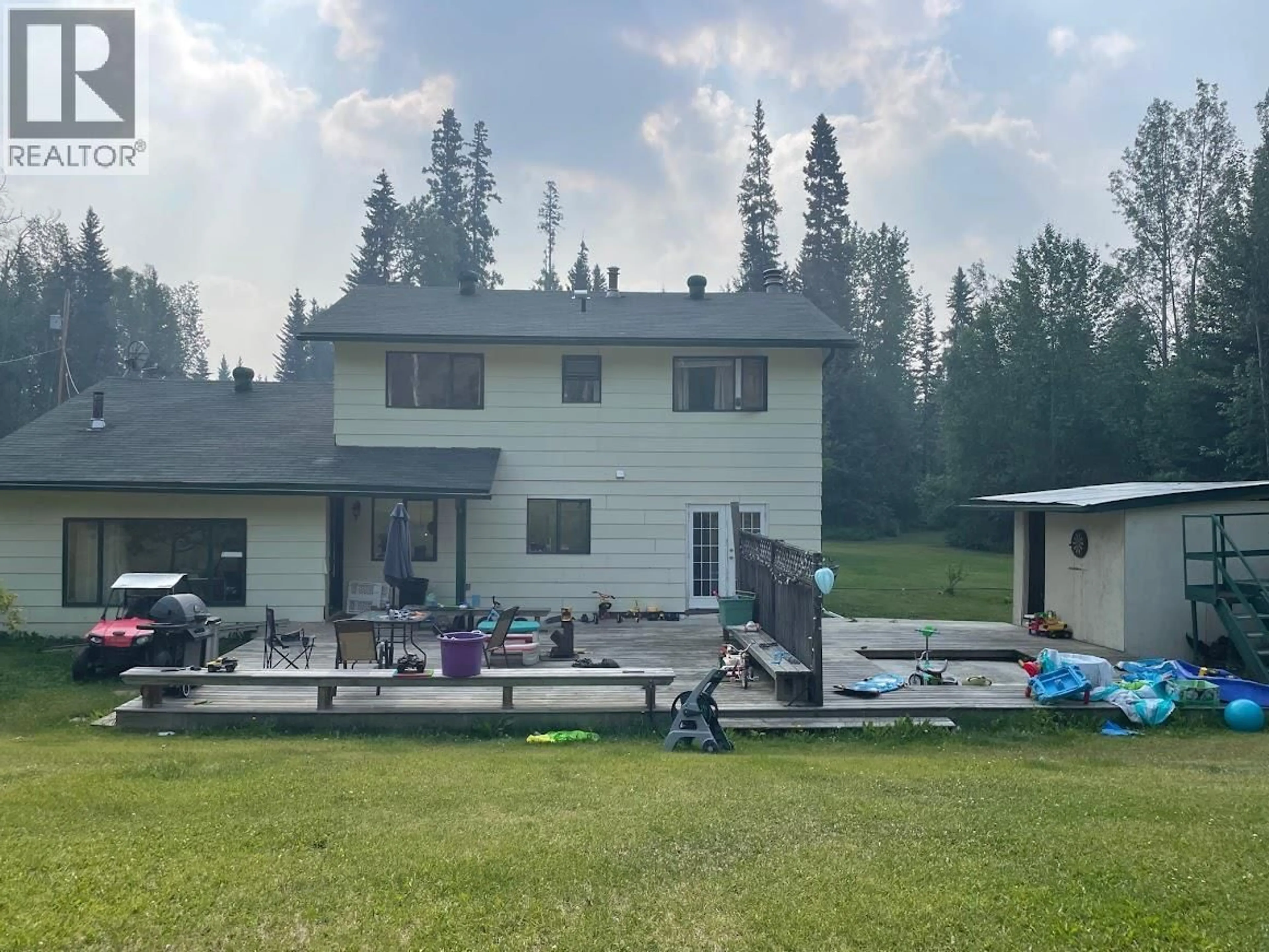 A pic from outside/outdoor area/front of a property/back of a property/a pic from drone, mountain view for 59 PIONEER WAY, Fort Nelson British Columbia V0C1R0