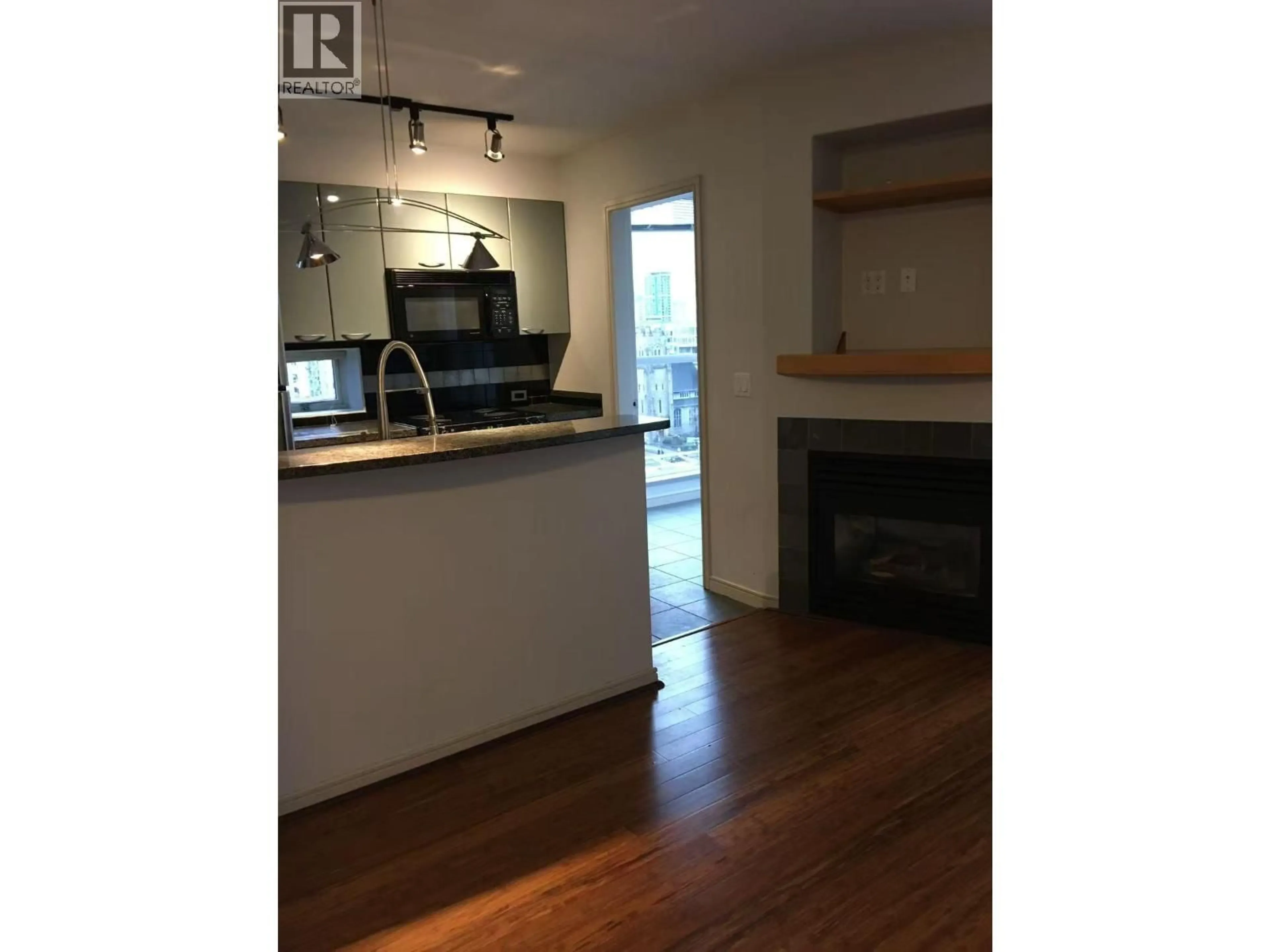 Open concept kitchen, wood/laminate floor for 1505 - 1068 HORNBY STREET, Vancouver British Columbia V6Z2Y7
