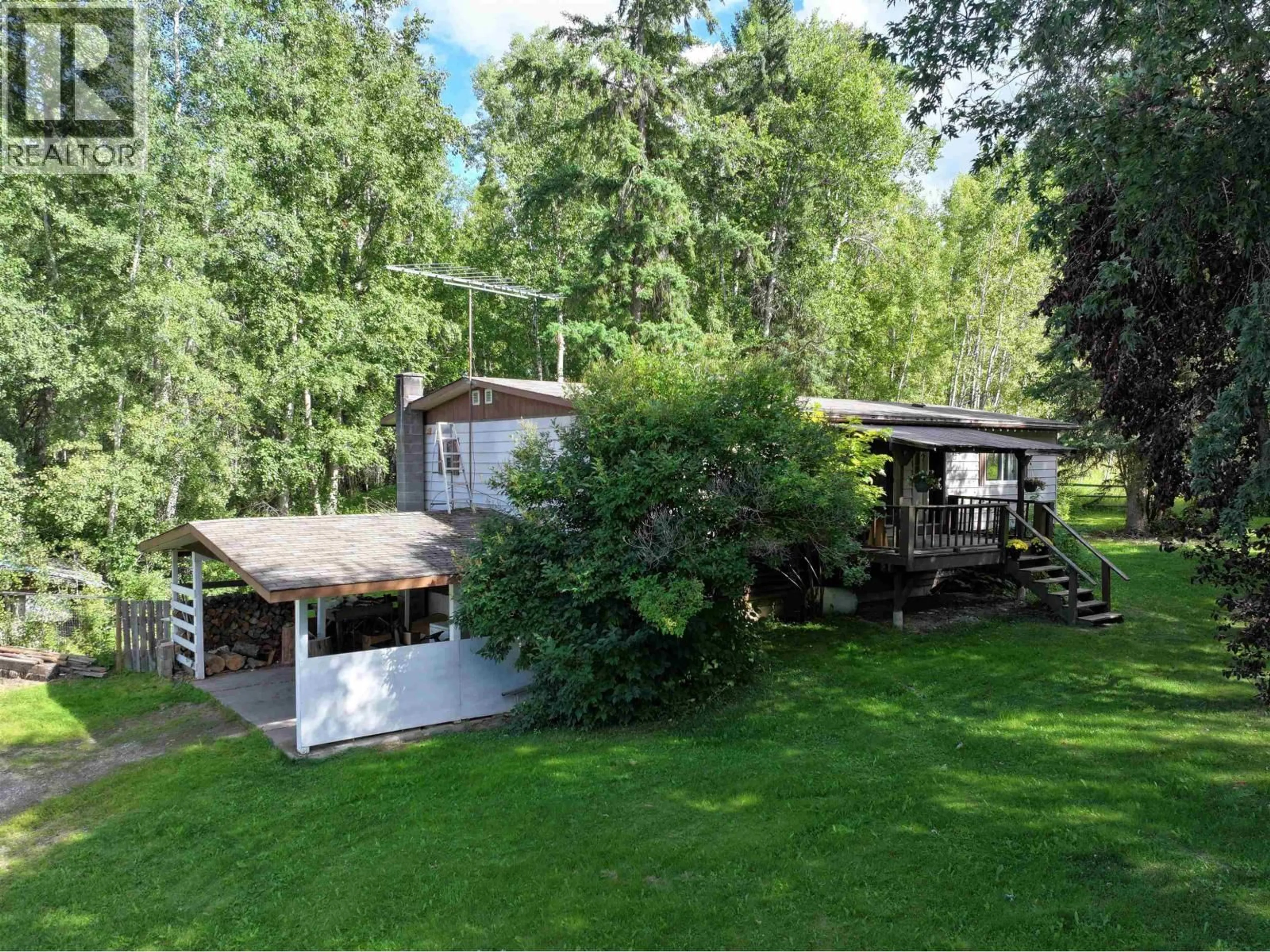 A pic from outside/outdoor area/front of a property/back of a property/a pic from drone, forest/trees view for 5016 BARTELS ROAD, Quesnel British Columbia V2J6Y7