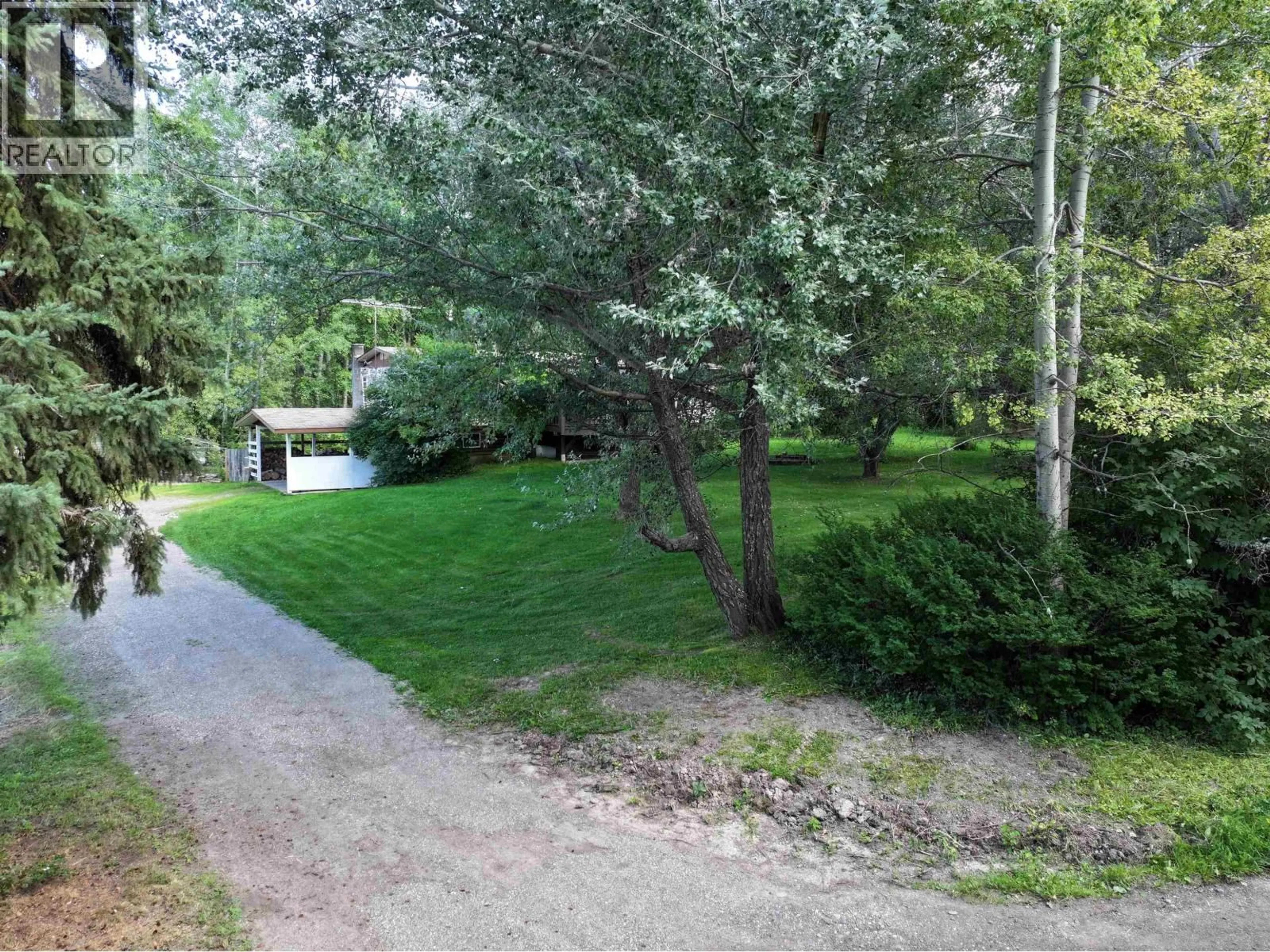 A pic from outside/outdoor area/front of a property/back of a property/a pic from drone, forest/trees view for 5016 BARTELS ROAD, Quesnel British Columbia V2J6Y7