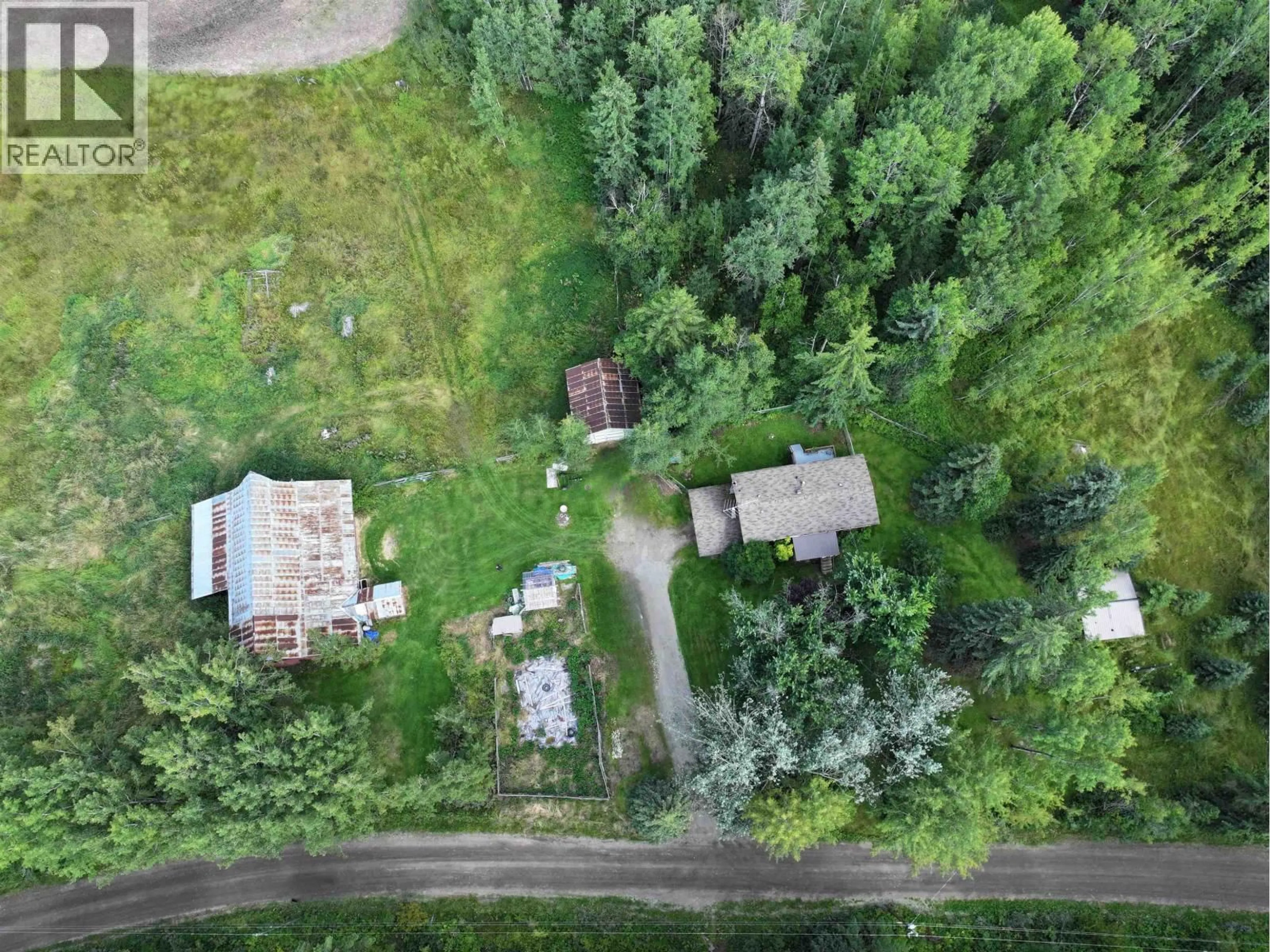 A pic from outside/outdoor area/front of a property/back of a property/a pic from drone, forest/trees view for 5016 BARTELS ROAD, Quesnel British Columbia V2J6Y7