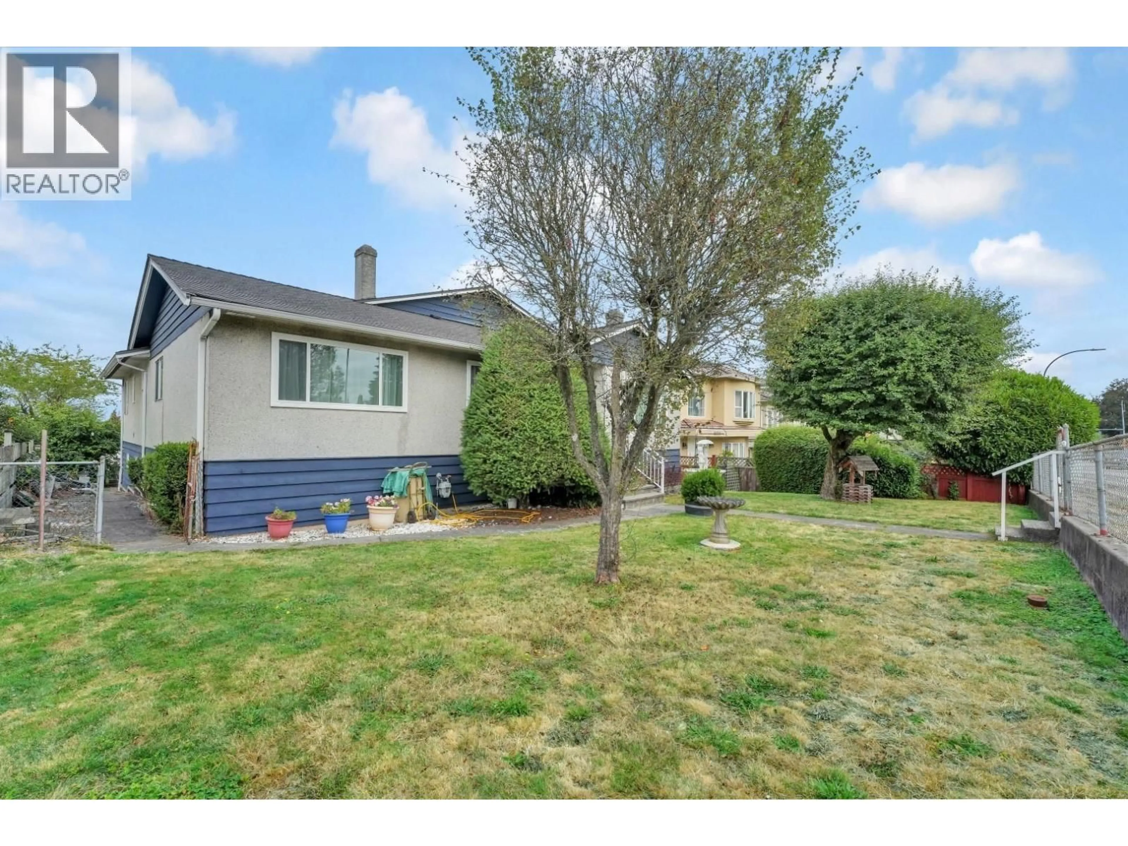 Home with vinyl exterior material, street for 5067 DOVER STREET, Burnaby British Columbia V5H1R4