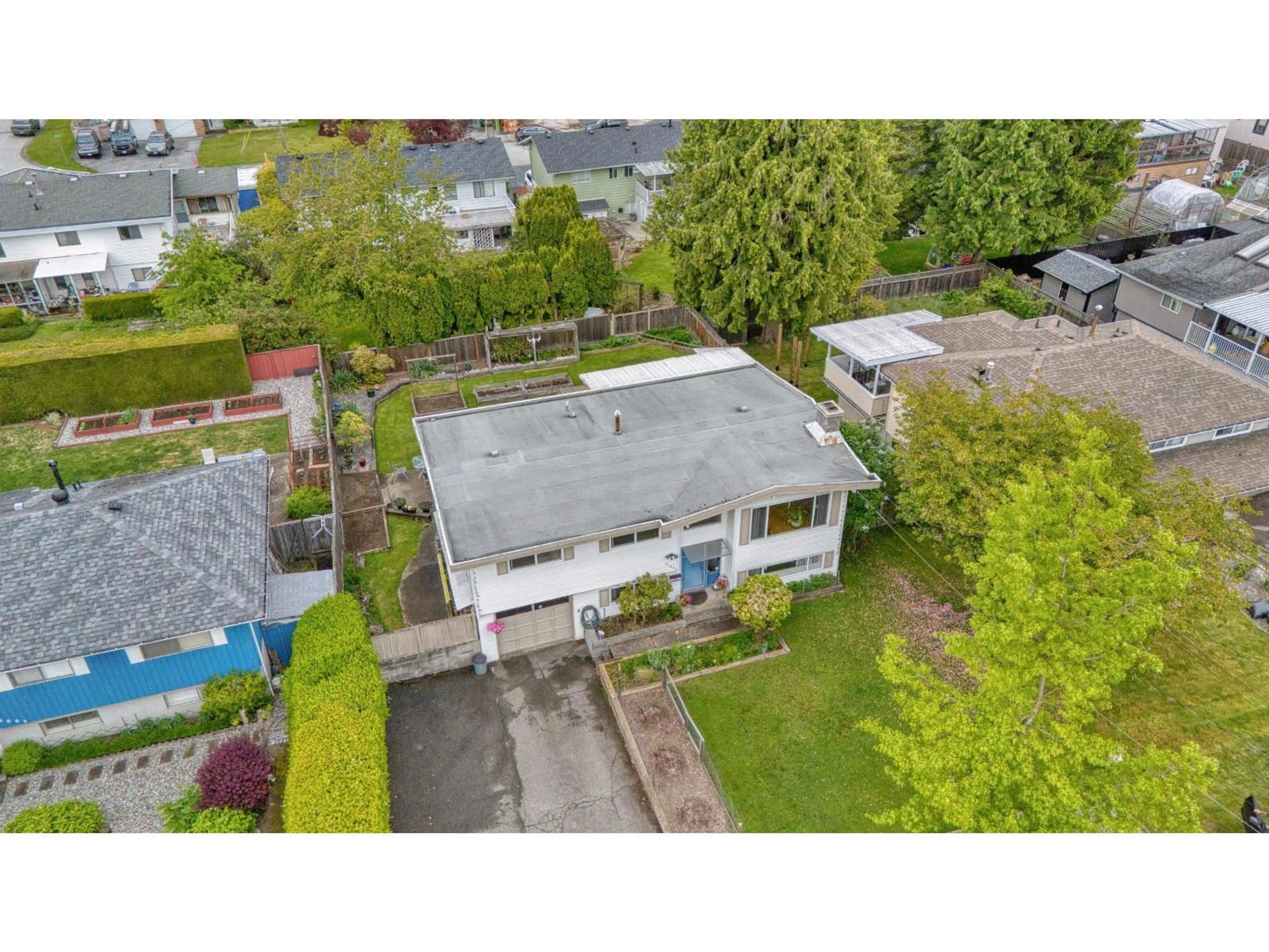A pic from outside/outdoor area/front of a property/back of a property/a pic from drone, street for 11671 94, Delta British Columbia V4C3R5