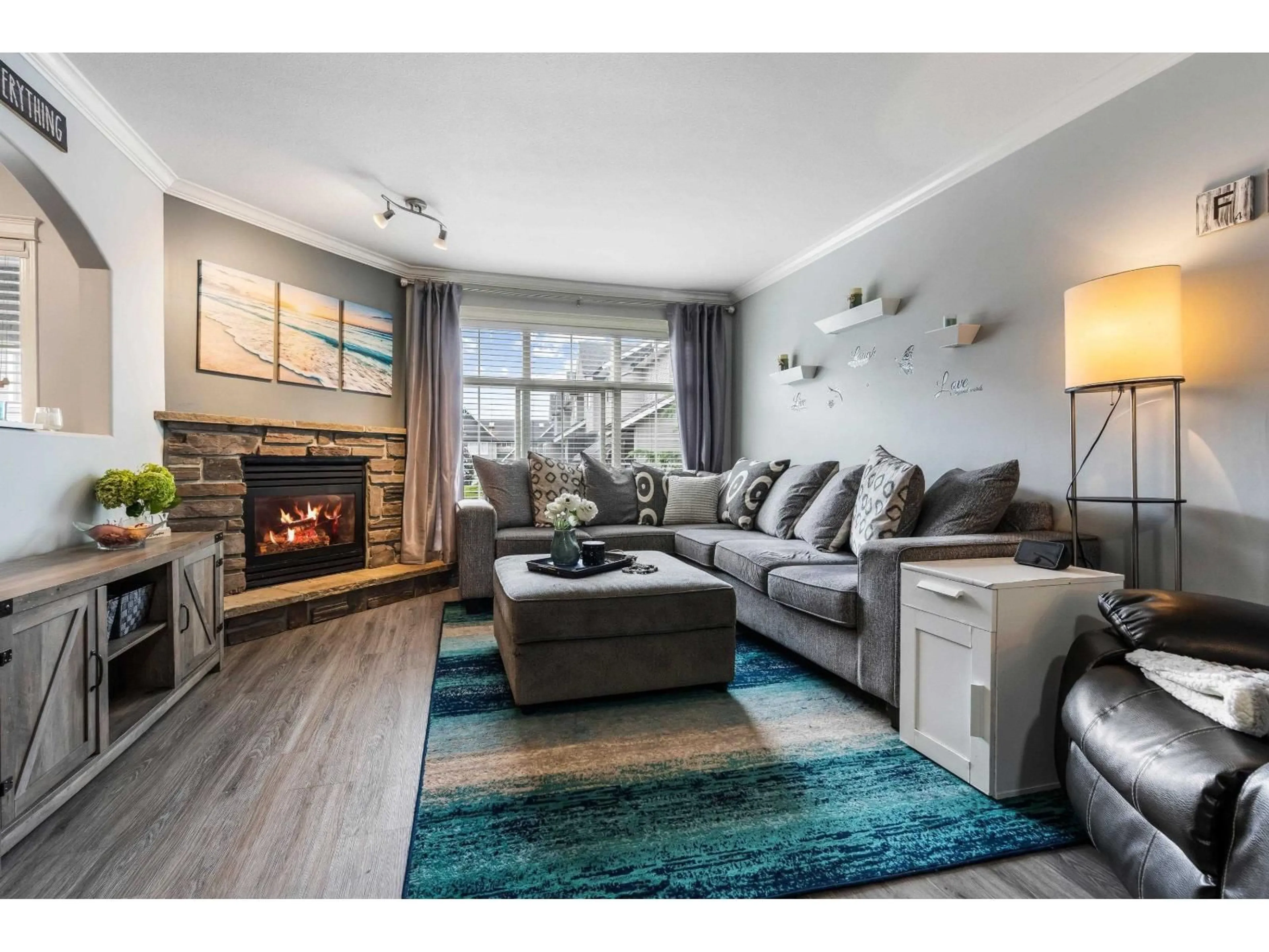Living room with furniture, wood/laminate floor for 67 - 5965 JINKERSON ROAD, Chilliwack British Columbia V2R5Z7