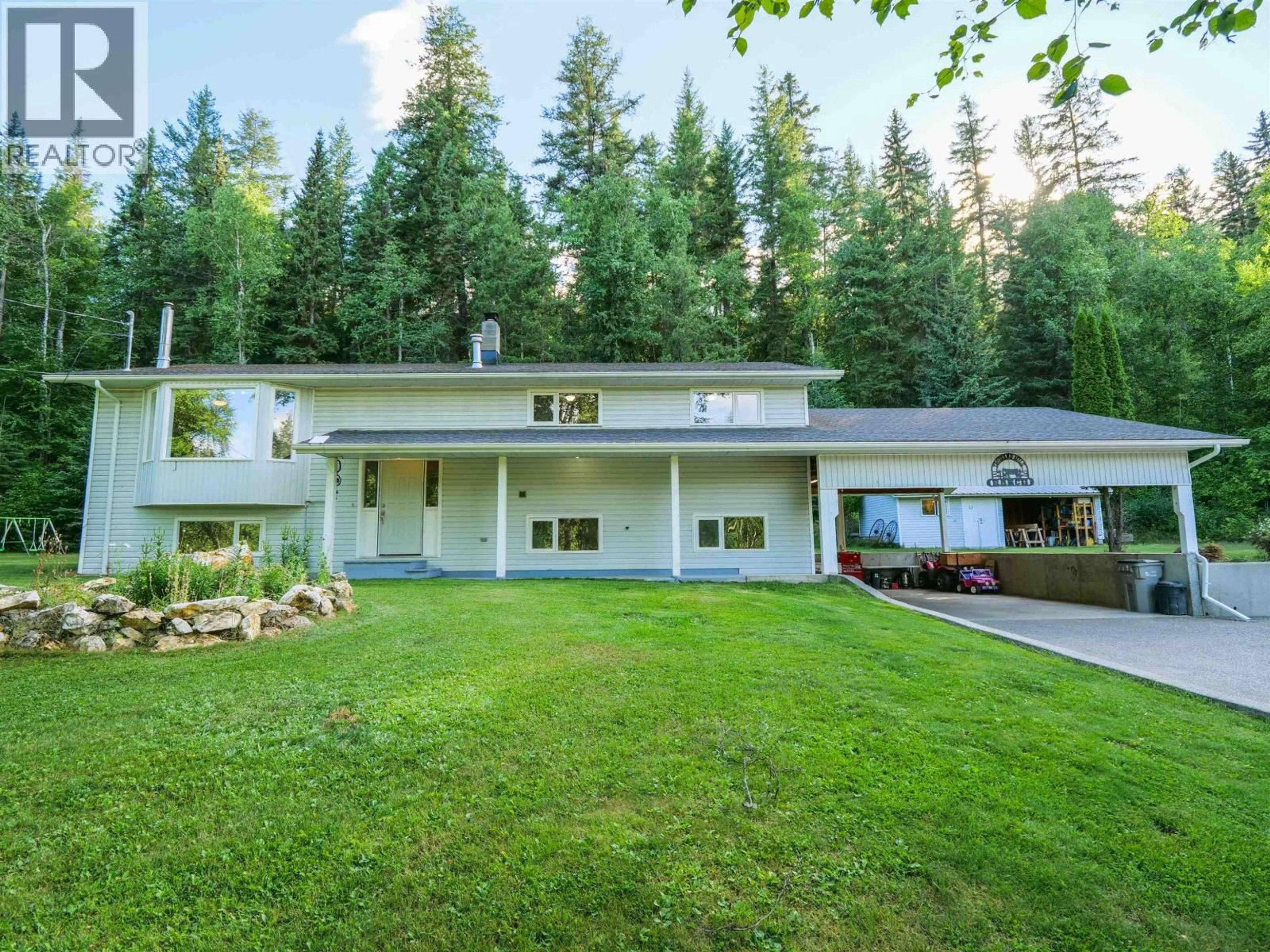 Home with vinyl exterior material, mountain view for 971 NORTH FRASER DRIVE, Quesnel British Columbia V2J1Z8