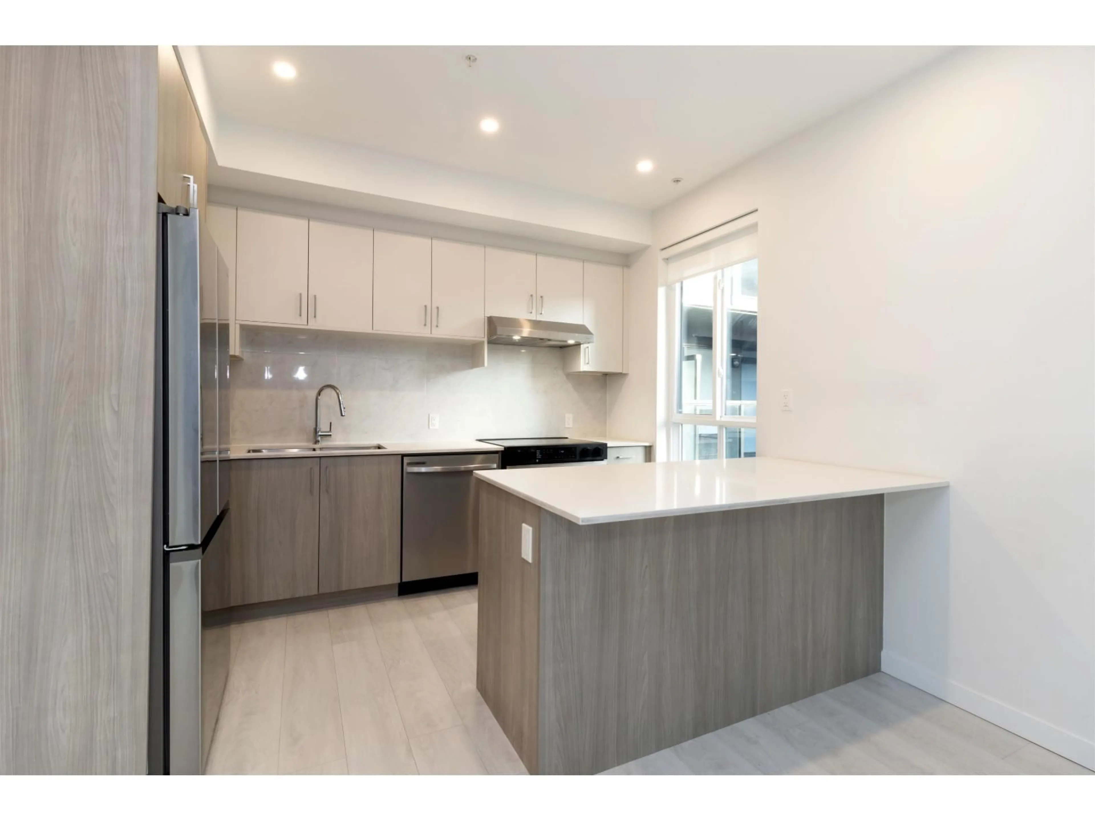 Open concept kitchen, unknown for 201 - 13838 108, Surrey British Columbia V3T0T8