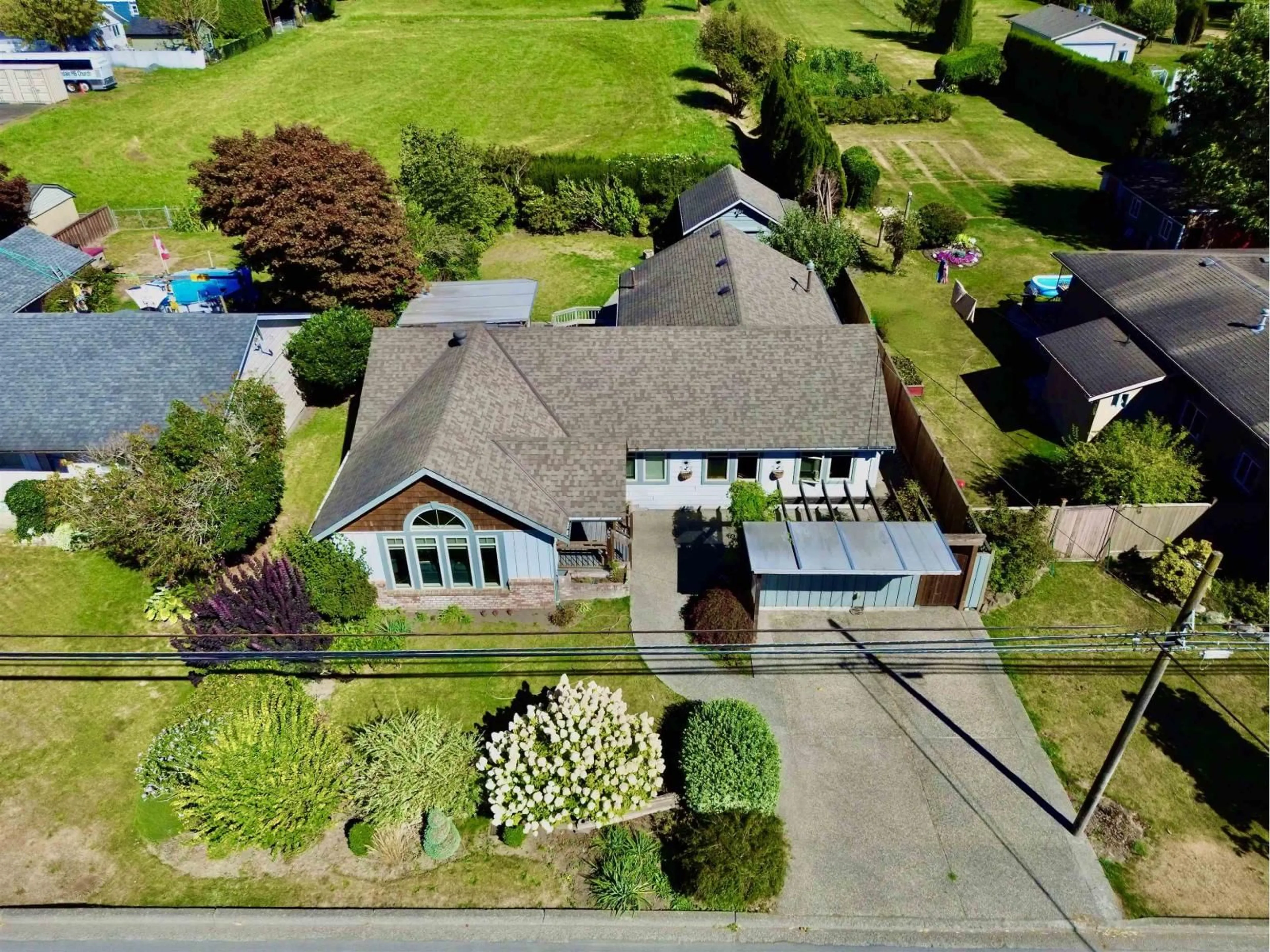 A pic from outside/outdoor area/front of a property/back of a property/a pic from drone, street for 6460 SUMAS PRAIRIE ROAD, Sardis - Greendale British Columbia V2R4K2
