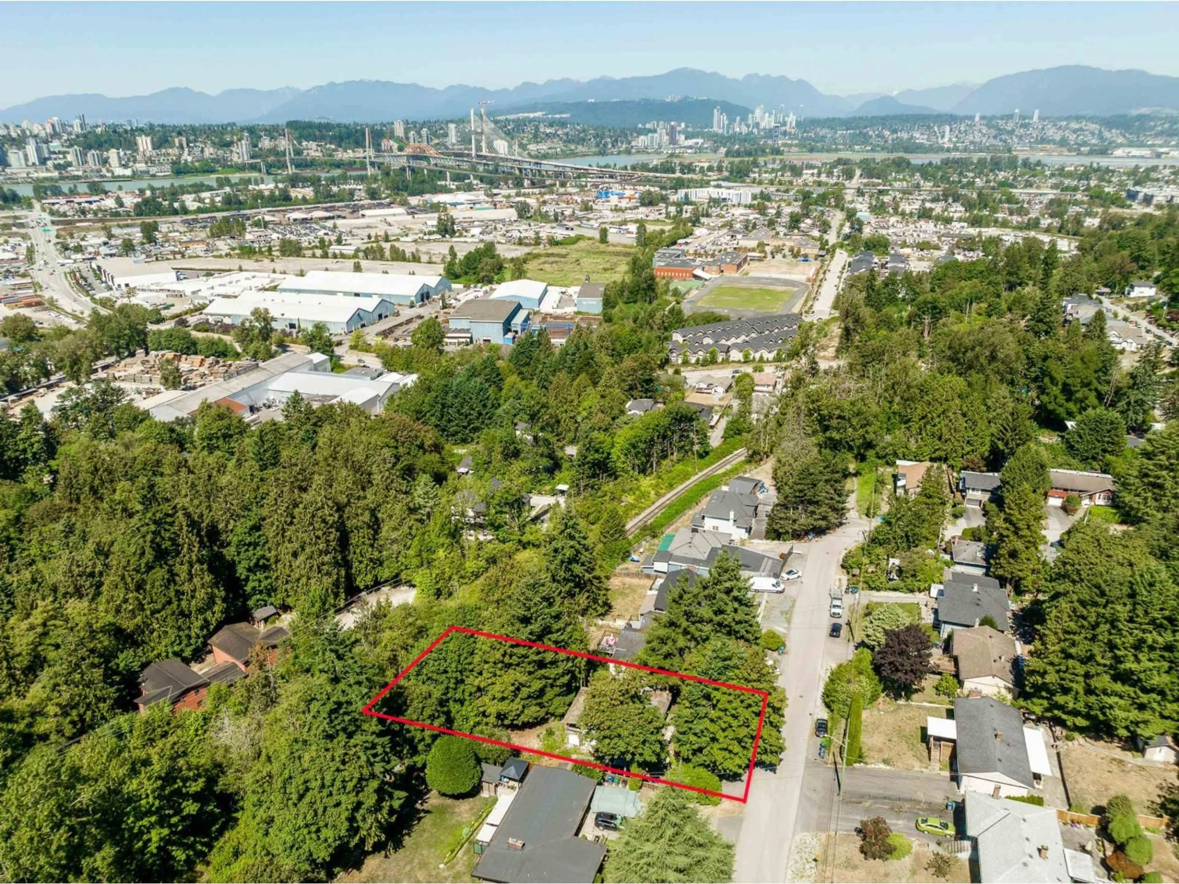 A pic from outside/outdoor area/front of a property/back of a property/a pic from drone, mountain view for 10257 124, Surrey British Columbia V3V4T4