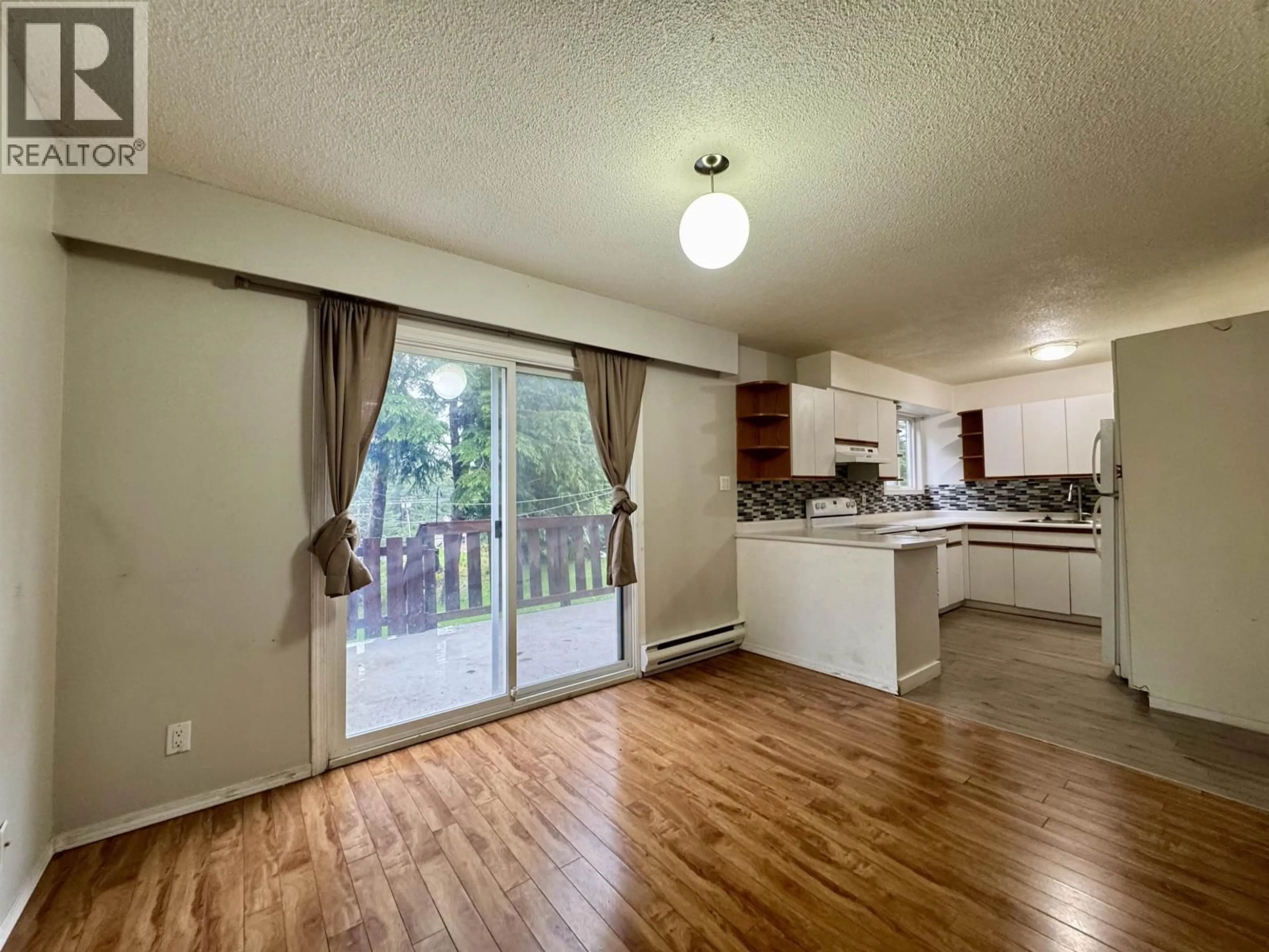 Open concept kitchen, wood/laminate floor for 1630 KOOTENAY AVENUE, Prince Rupert British Columbia V8J2A8