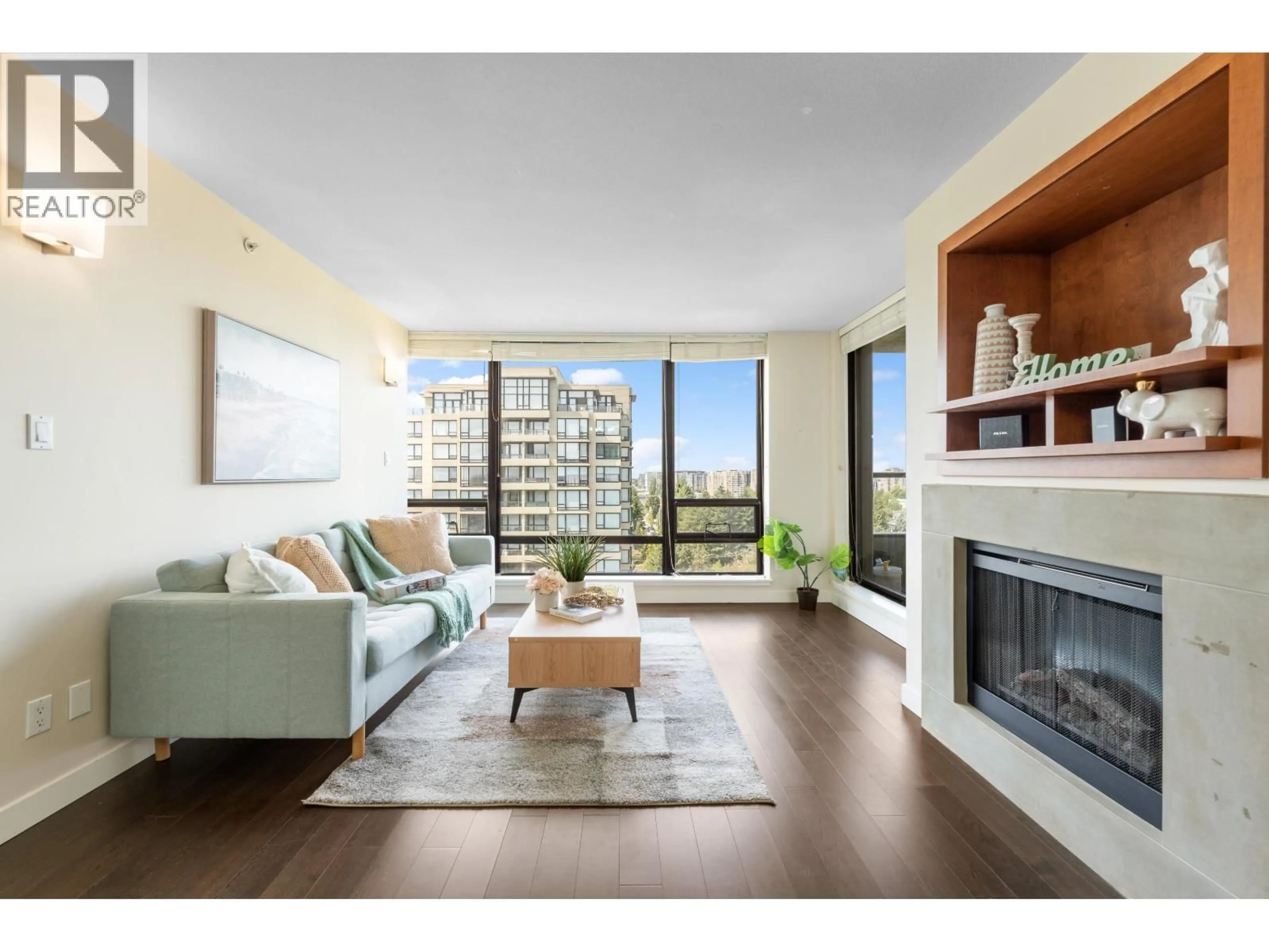 Living room with furniture, wood/laminate floor for 1501 - 9133 HEMLOCK DRIVE, Richmond British Columbia V6Y4J9