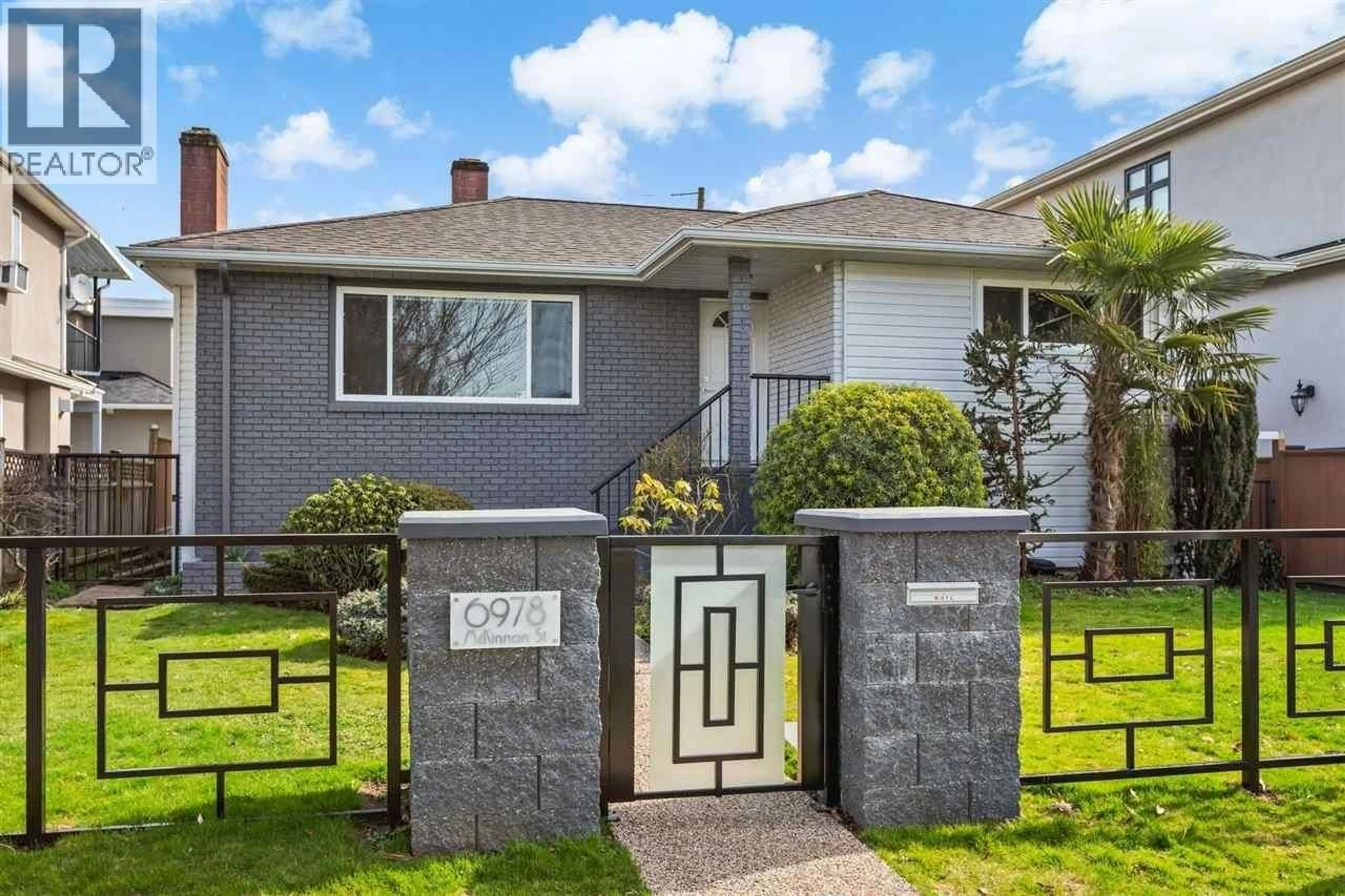 Home with vinyl exterior material, street for 6978 MCKINNON STREET, Vancouver British Columbia V5S3G5
