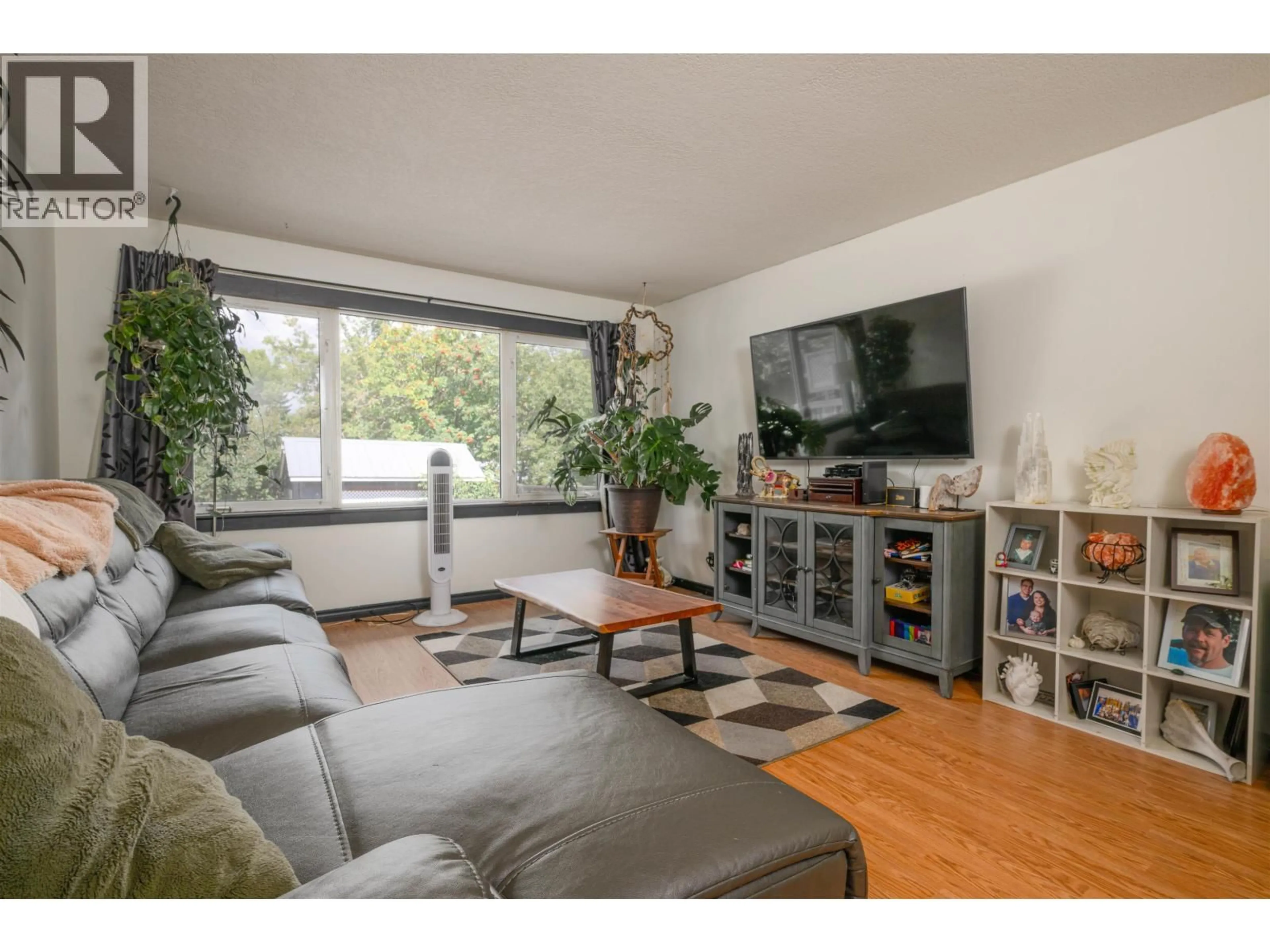 Living room with furniture, wood/laminate floor for 188 WATSON CRESCENT, Prince George British Columbia V2L4P3