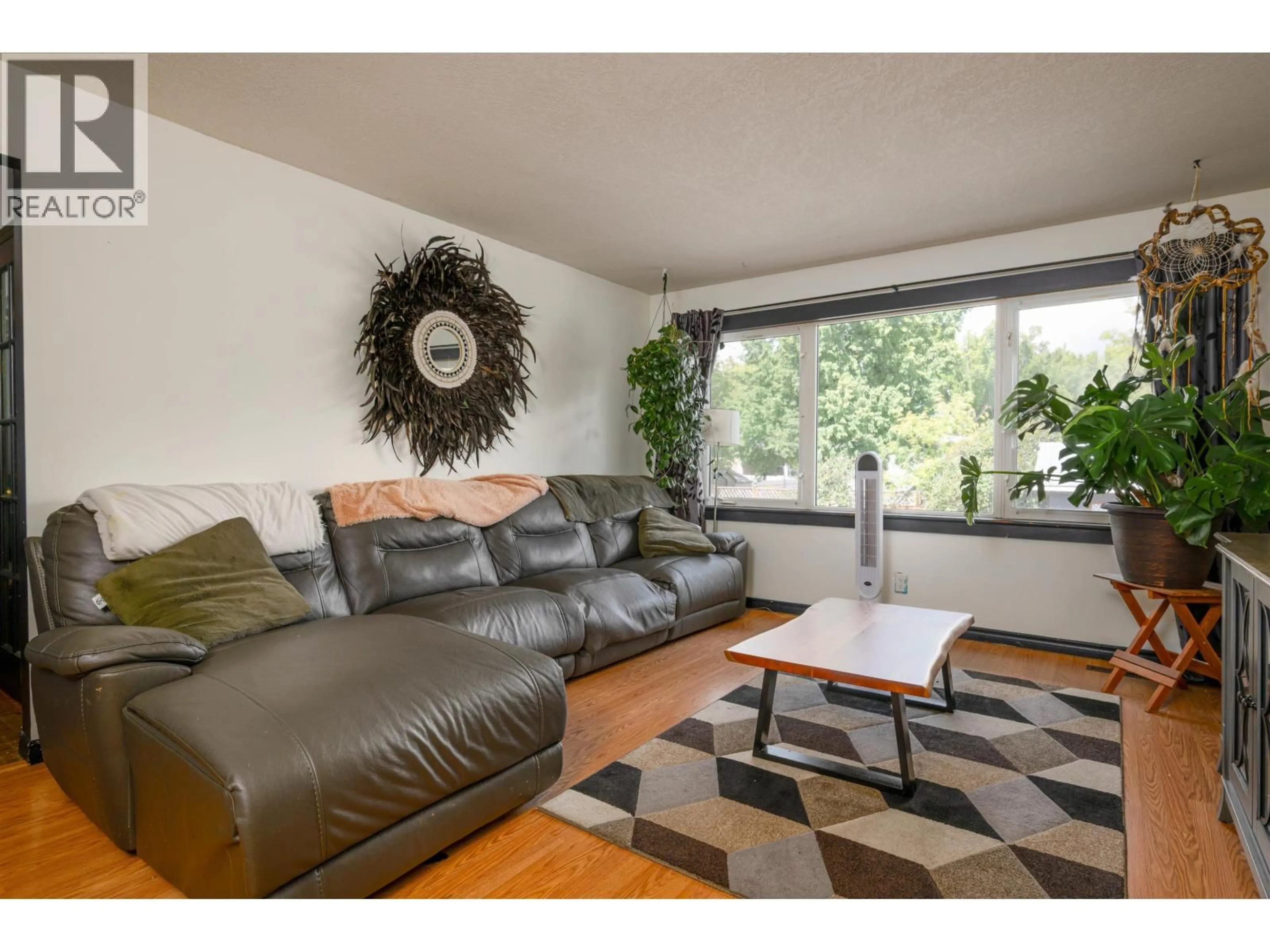 Living room with furniture, wood/laminate floor for 188 WATSON CRESCENT, Prince George British Columbia V2L4P3