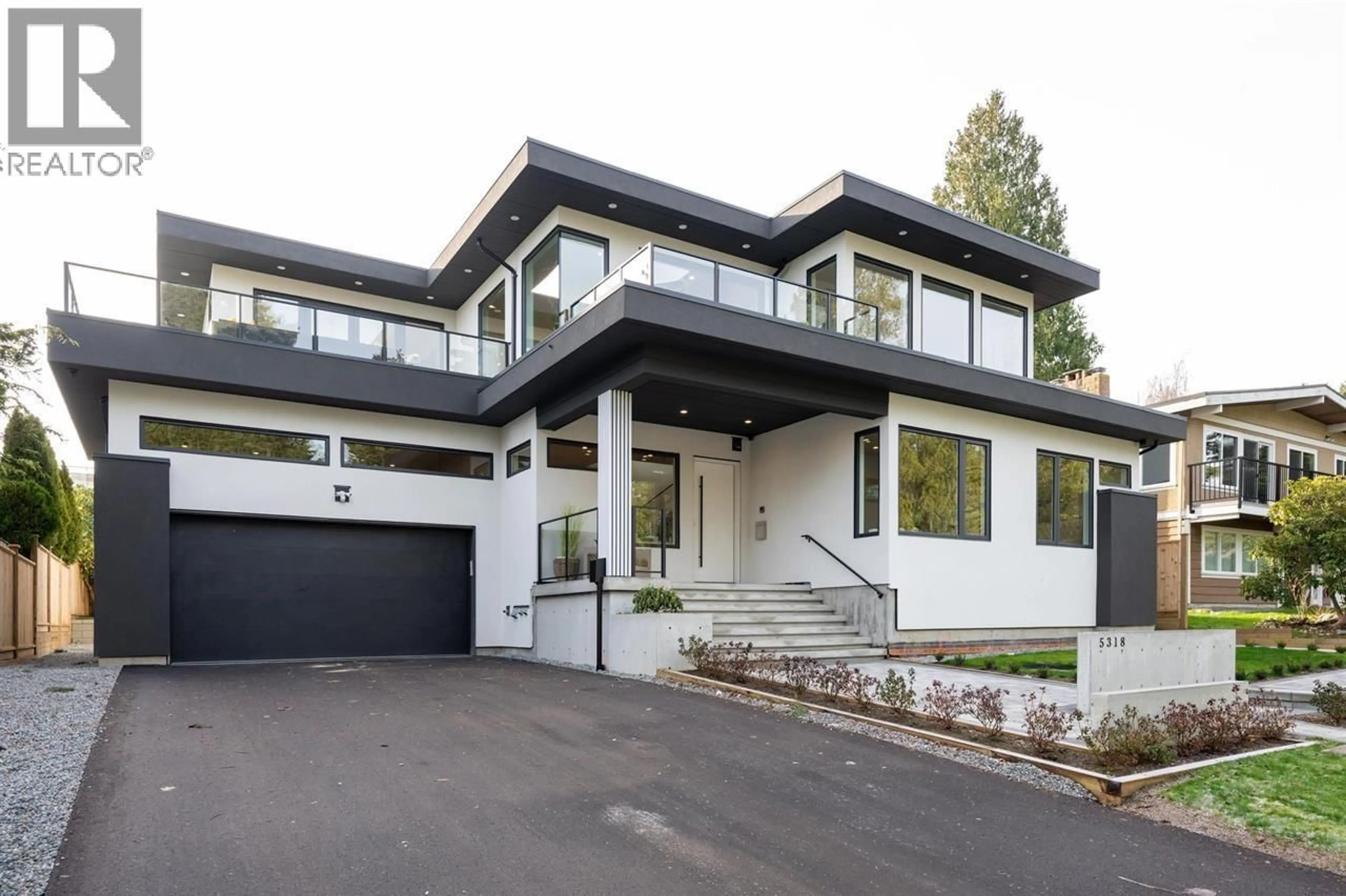 Home with vinyl exterior material, street for 5318 4A AVENUE, Delta British Columbia V4M1H5