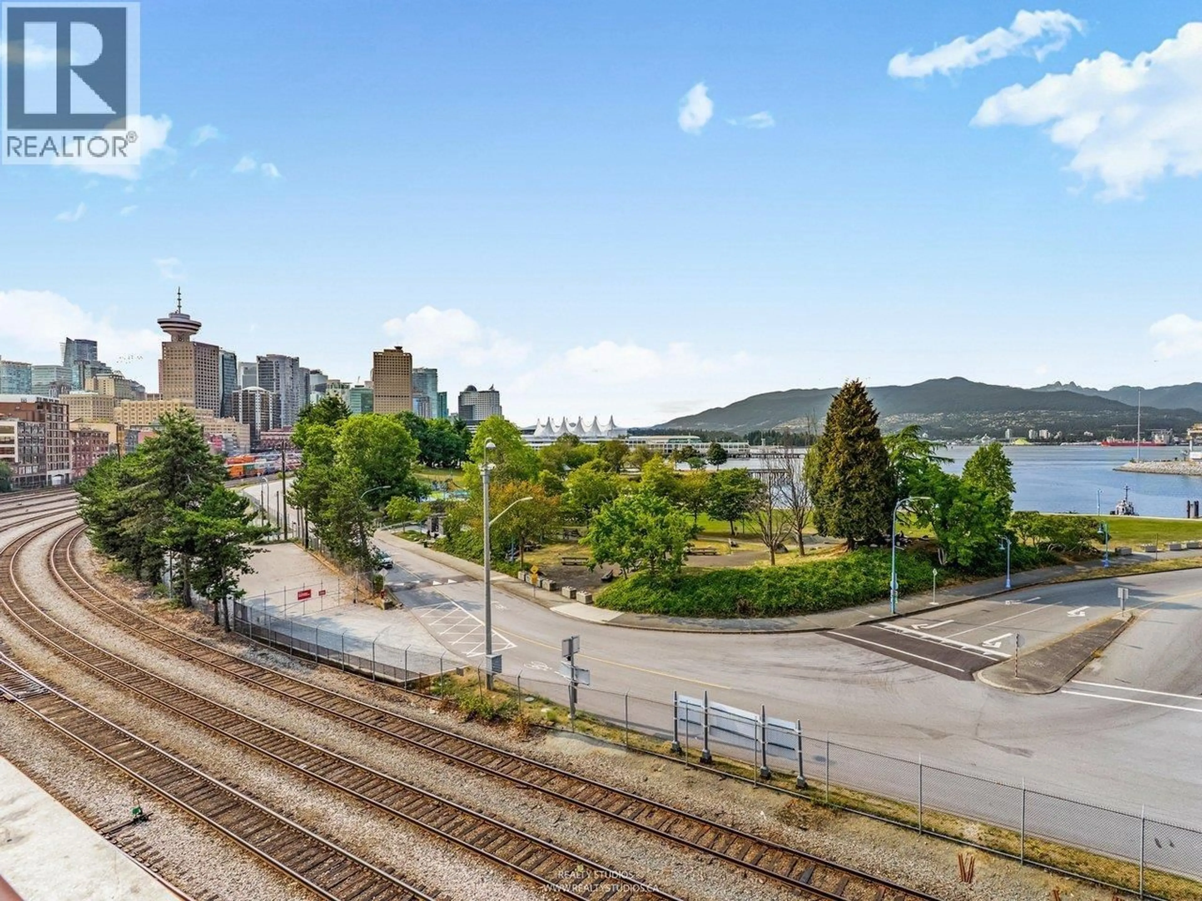 A pic from outside/outdoor area/front of a property/back of a property/a pic from drone, city buildings view from balcony for 141 ALEXANDER STREET, Vancouver British Columbia V6A1B8