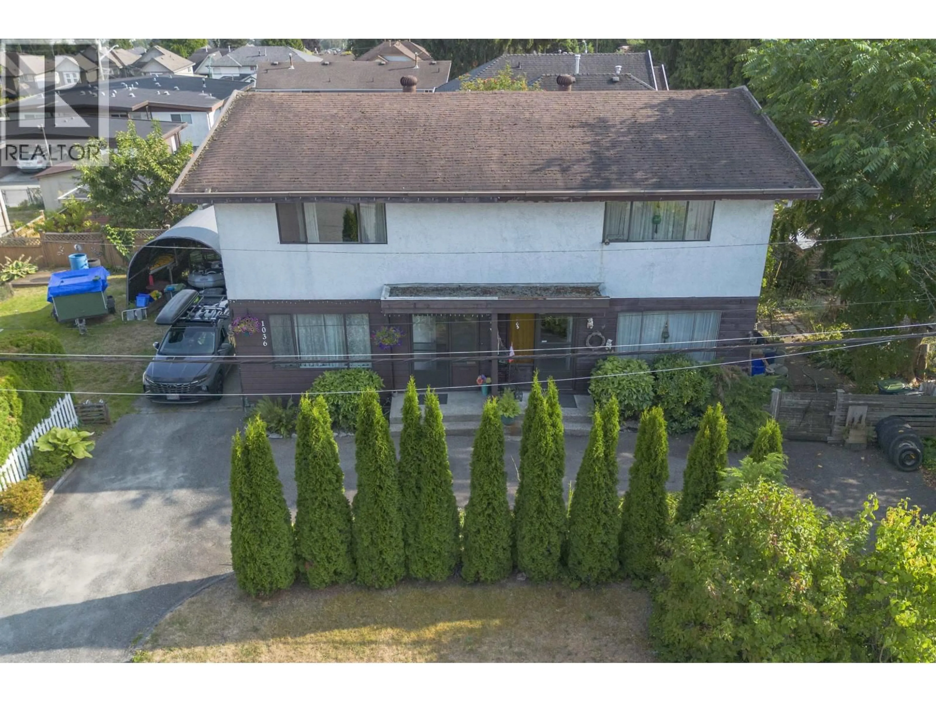 A pic from outside/outdoor area/front of a property/back of a property/a pic from drone, street for 1034 CHARLAND AVENUE, Coquitlam British Columbia V3K3K9