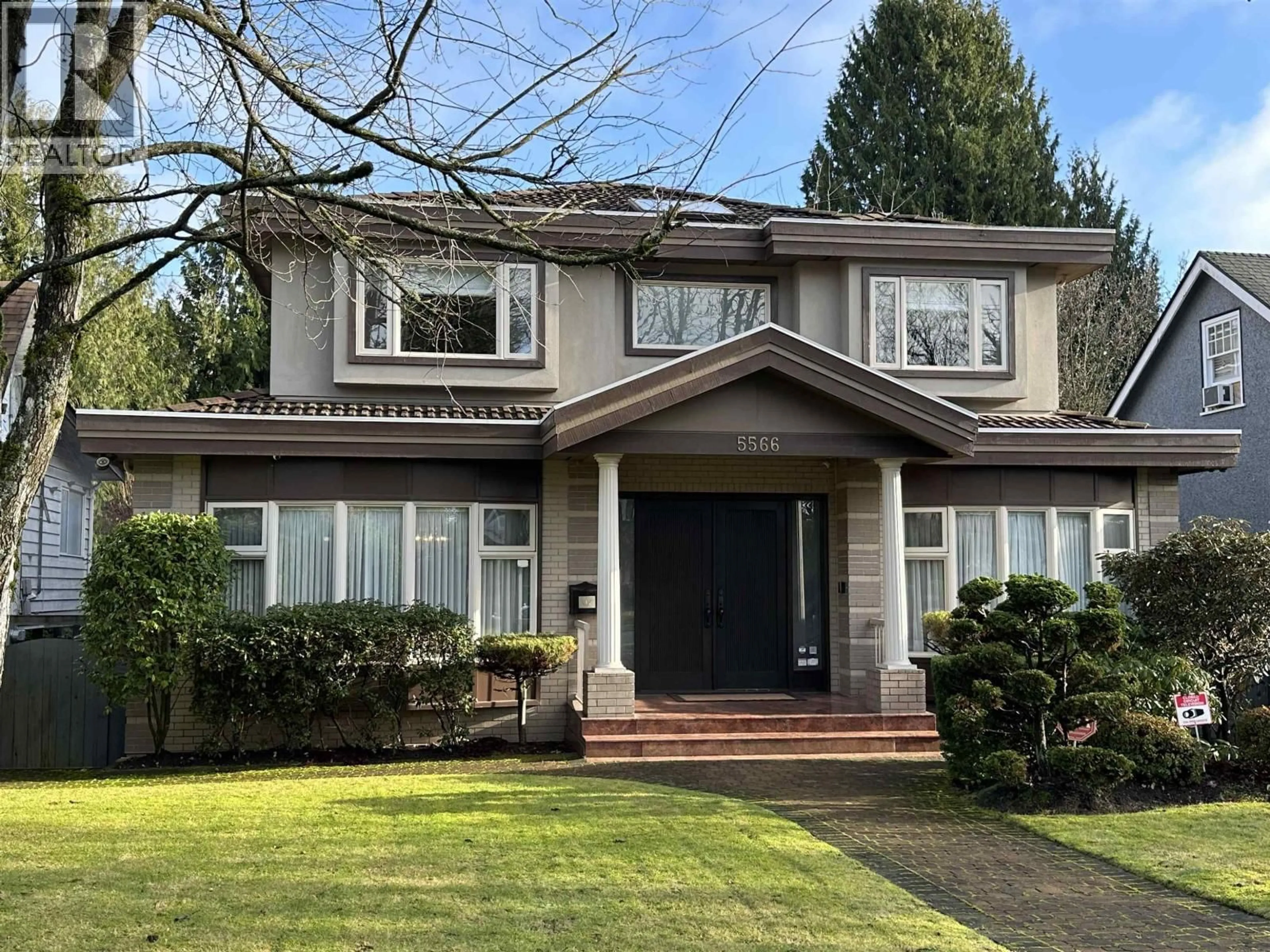 Home with brick exterior material, street for 5566 TRAFALGAR STREET, Vancouver British Columbia V6N1C3