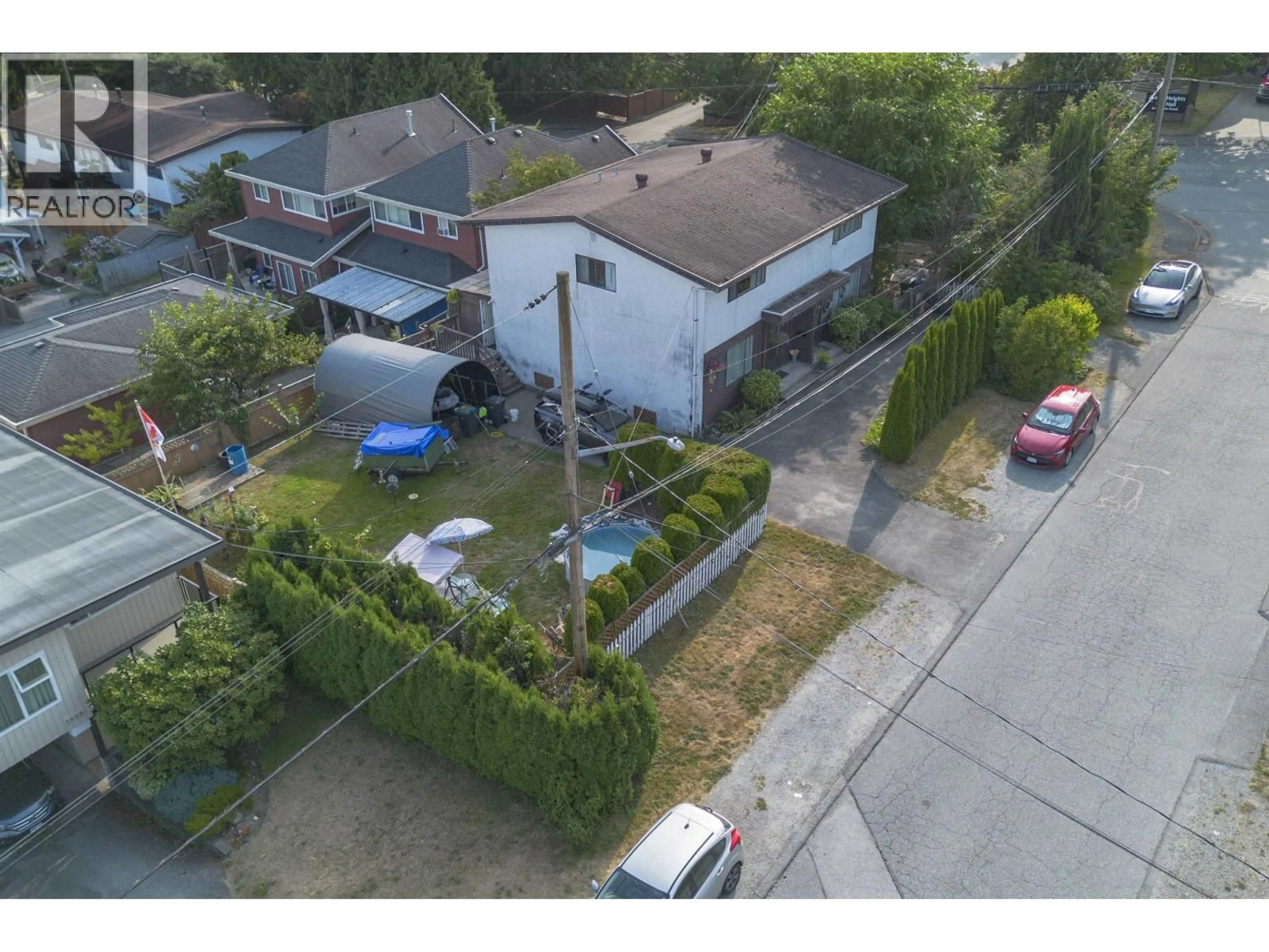 A pic from outside/outdoor area/front of a property/back of a property/a pic from drone, street for 1036 CHARLAND AVENUE, Coquitlam British Columbia V3K3K9