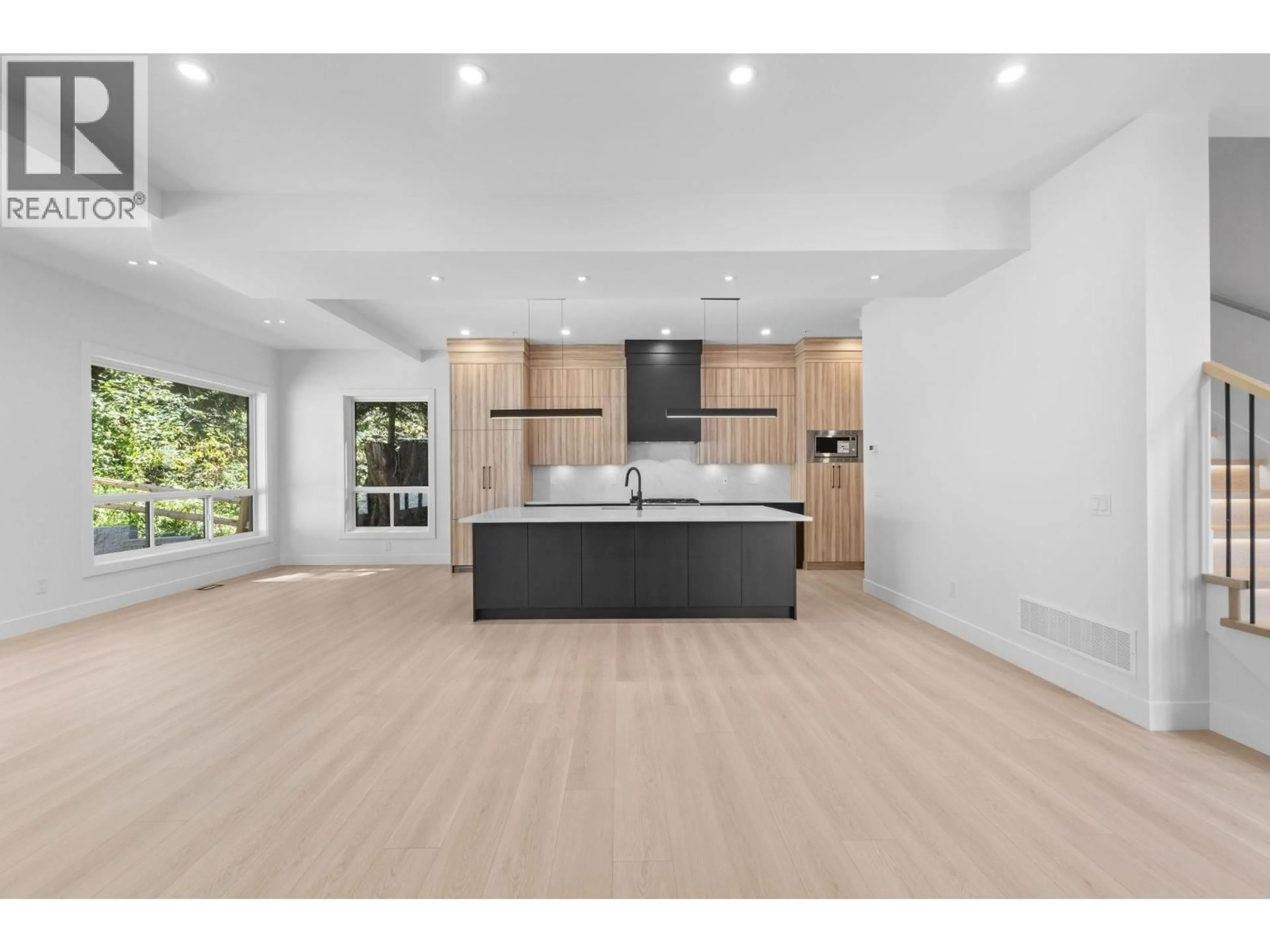 Open concept kitchen, wood/laminate floor for 13158 236 STREET, Maple Ridge British Columbia V4R2S5