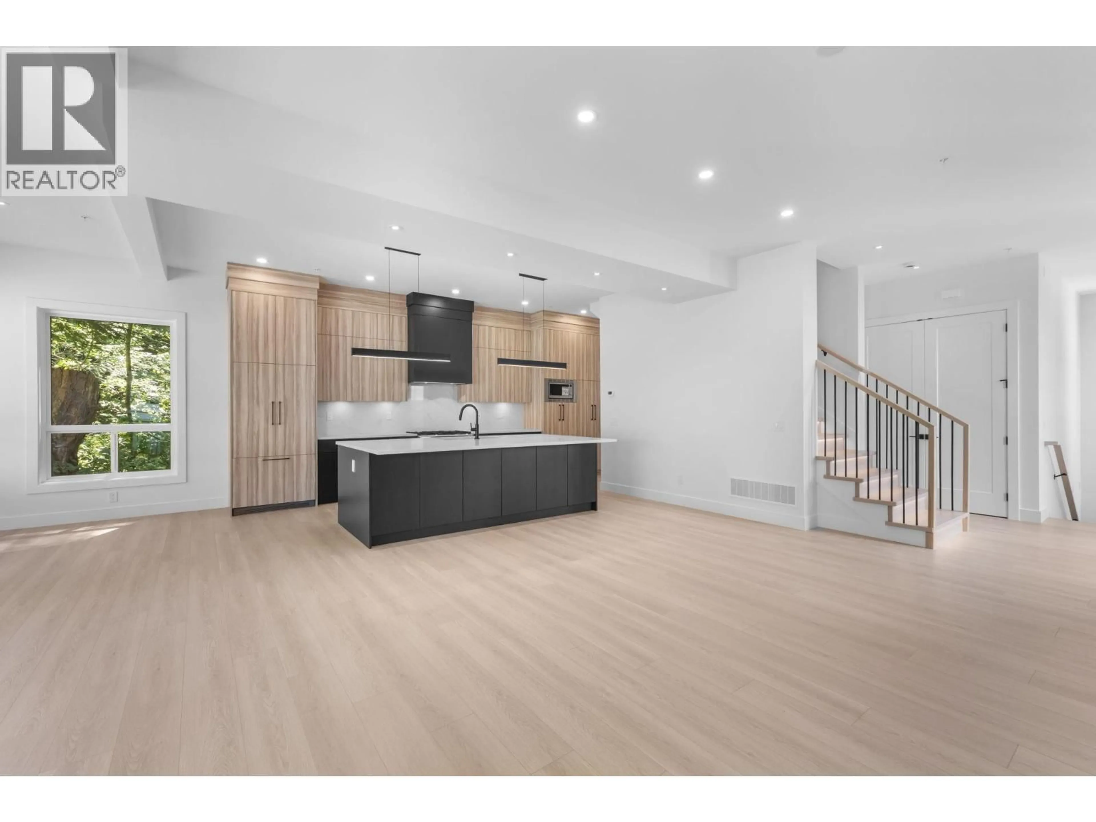 Open concept kitchen, wood/laminate floor for 13158 236 STREET, Maple Ridge British Columbia V4R2S5