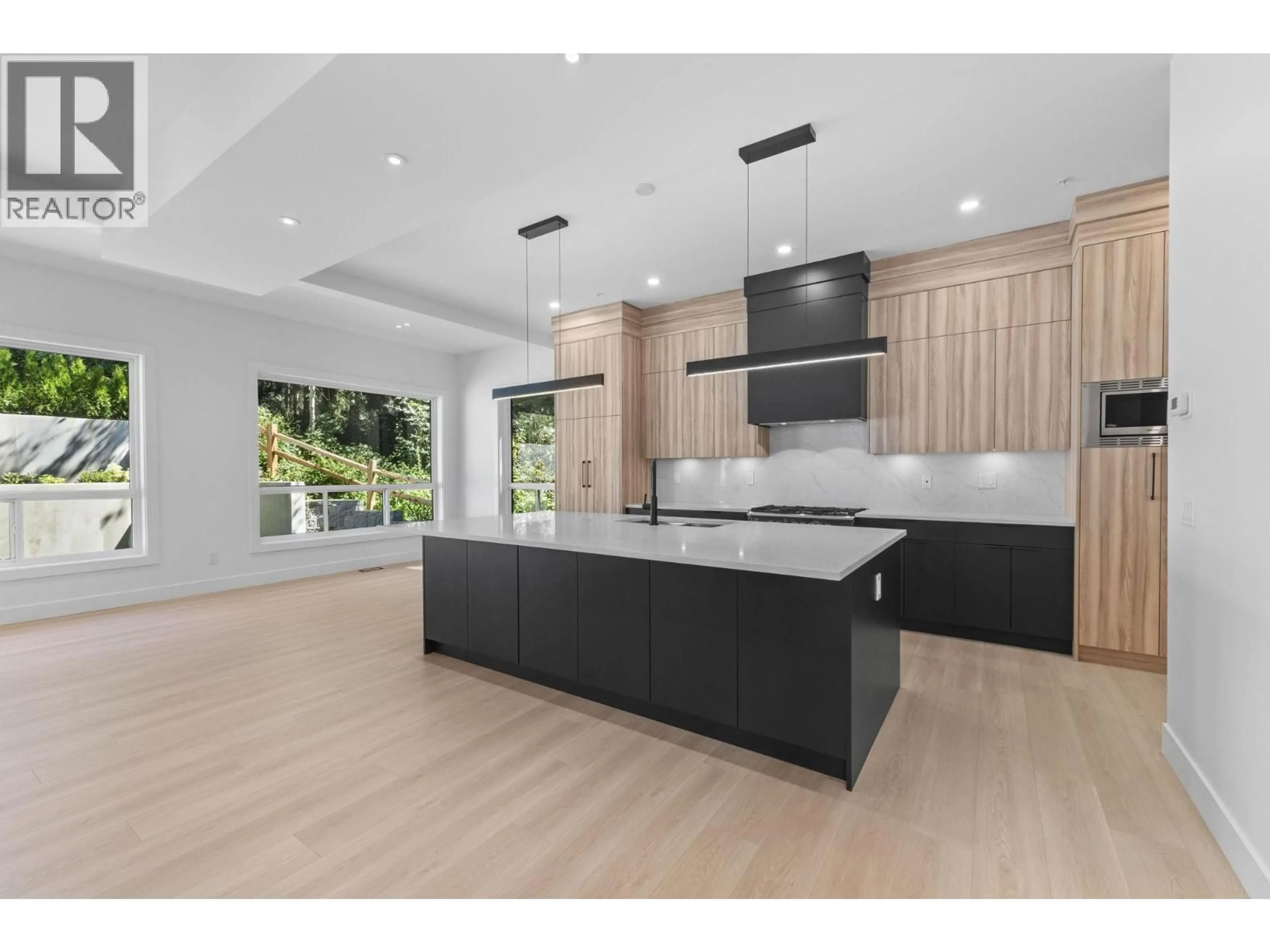 Open concept kitchen, wood/laminate floor for 13158 236 STREET, Maple Ridge British Columbia V4R2S5