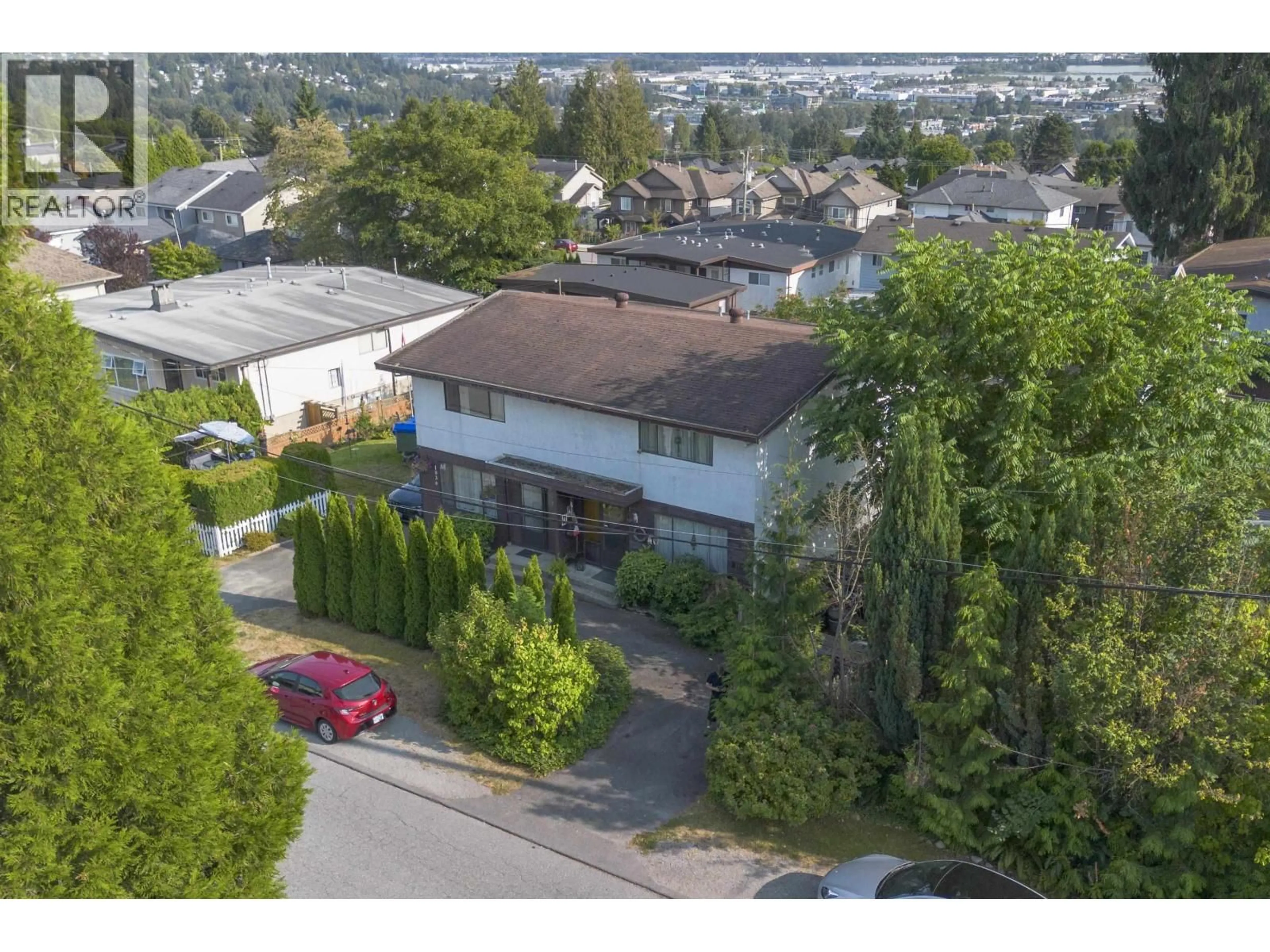 A pic from outside/outdoor area/front of a property/back of a property/a pic from drone, street for 1036 CHARLAND AVENUE, Coquitlam British Columbia V3K3K9