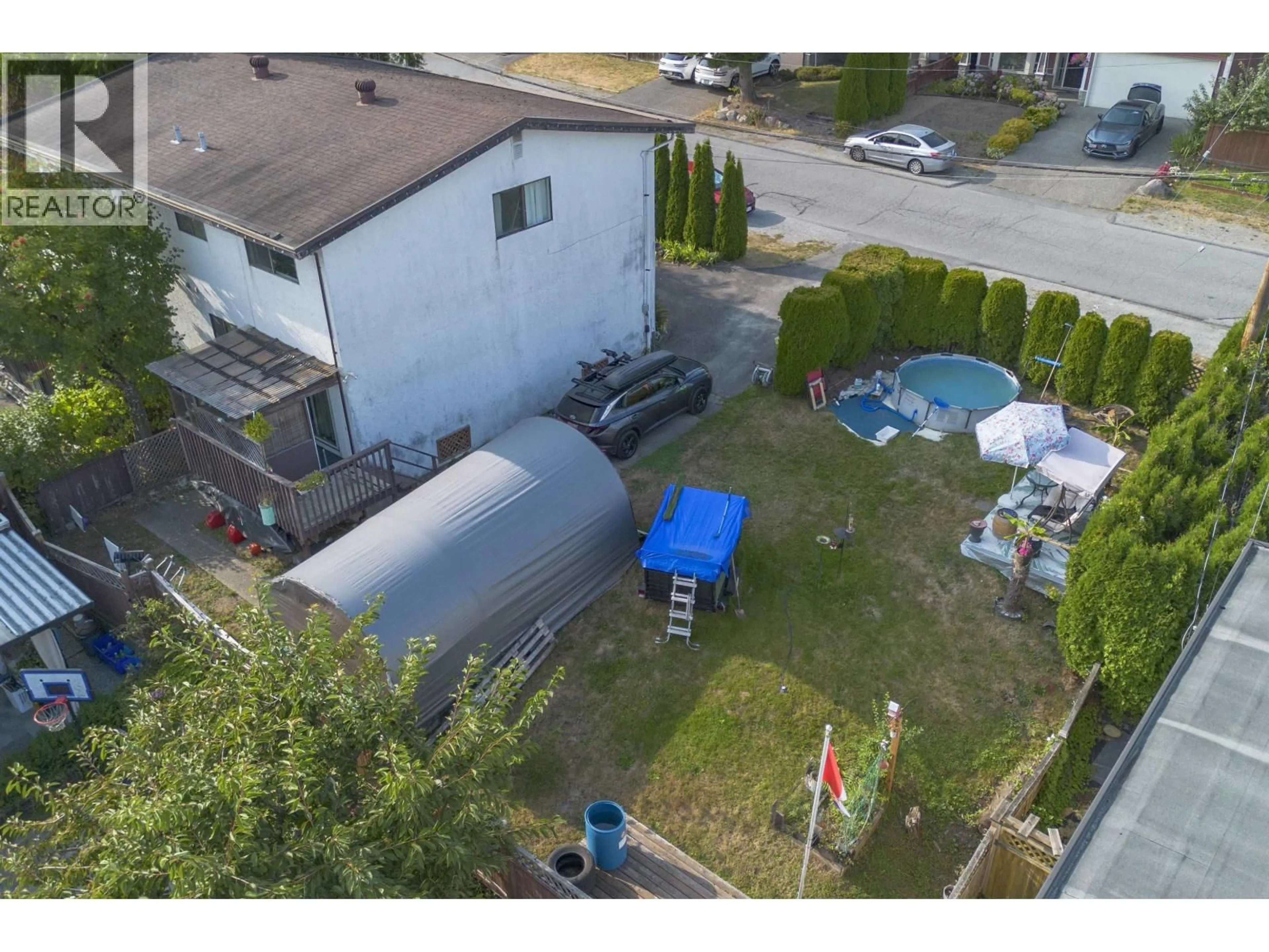 A pic from outside/outdoor area/front of a property/back of a property/a pic from drone, street for 1036 CHARLAND AVENUE, Coquitlam British Columbia V3K3K9