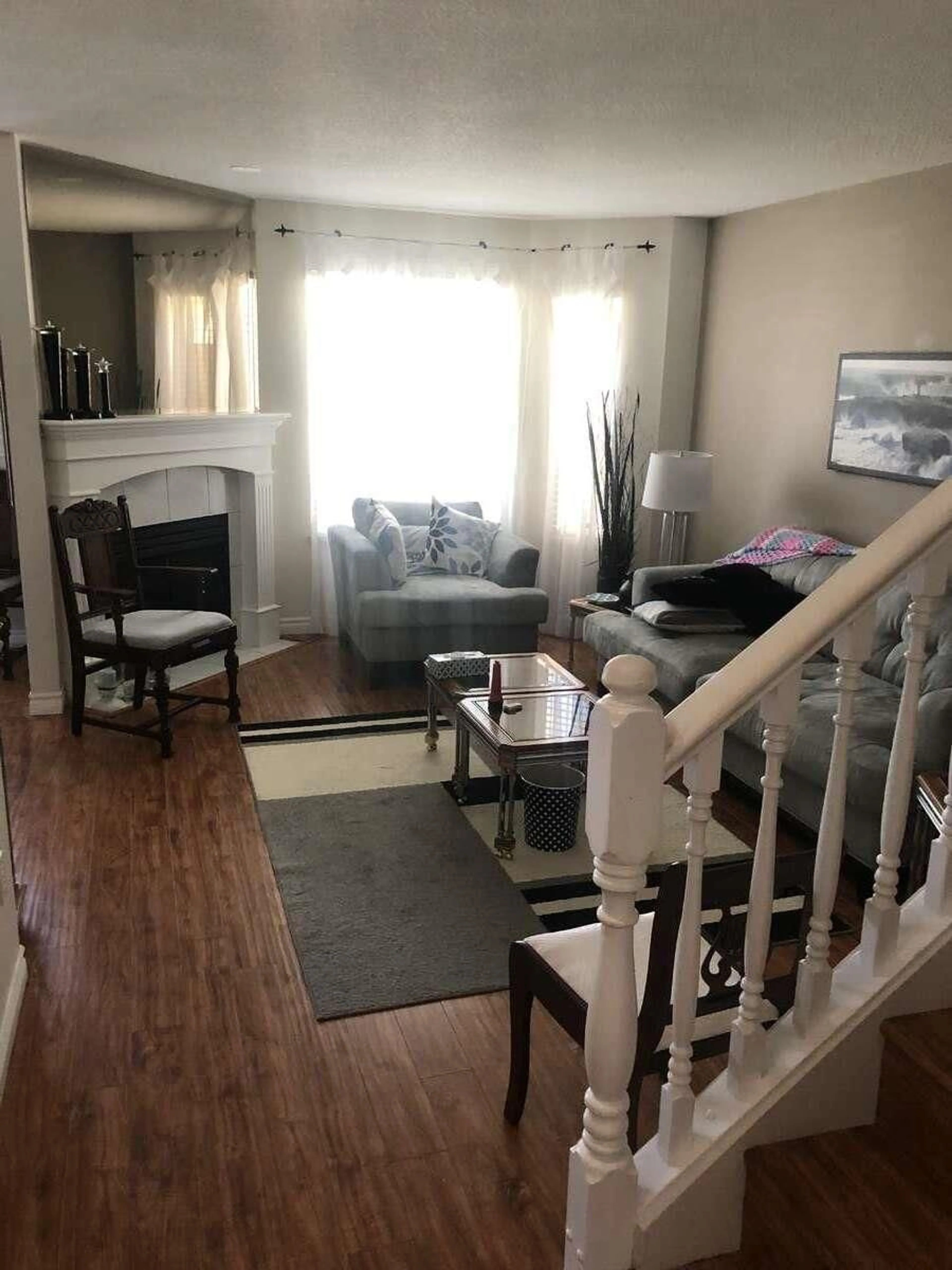 Living room with furniture, wood/laminate floor for 9 - 21928 48, Langley British Columbia V3A8H1
