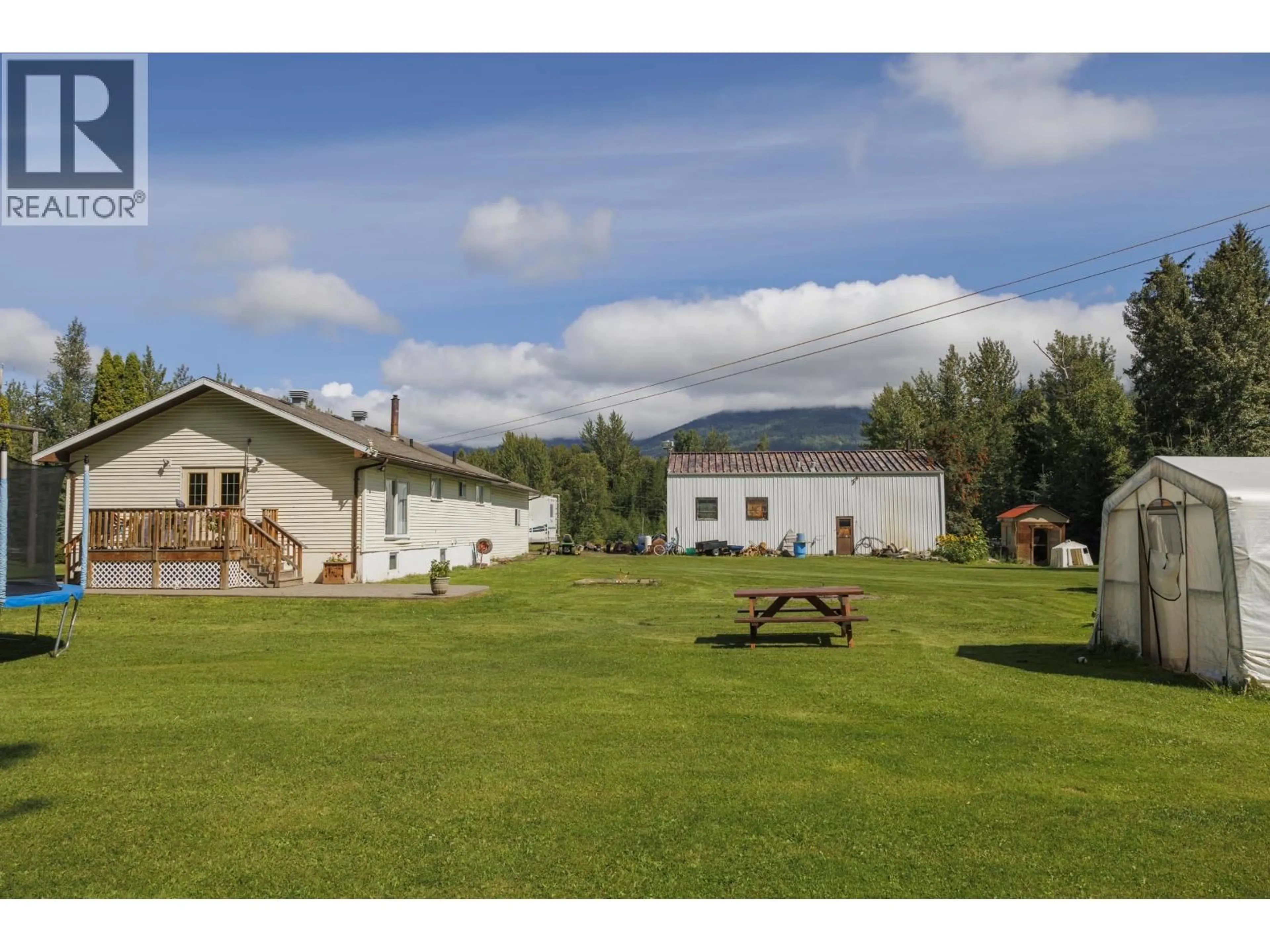 A pic from outside/outdoor area/front of a property/back of a property/a pic from drone, mountain view for 1200 DORVAL ROAD, McBride British Columbia V0J2E0