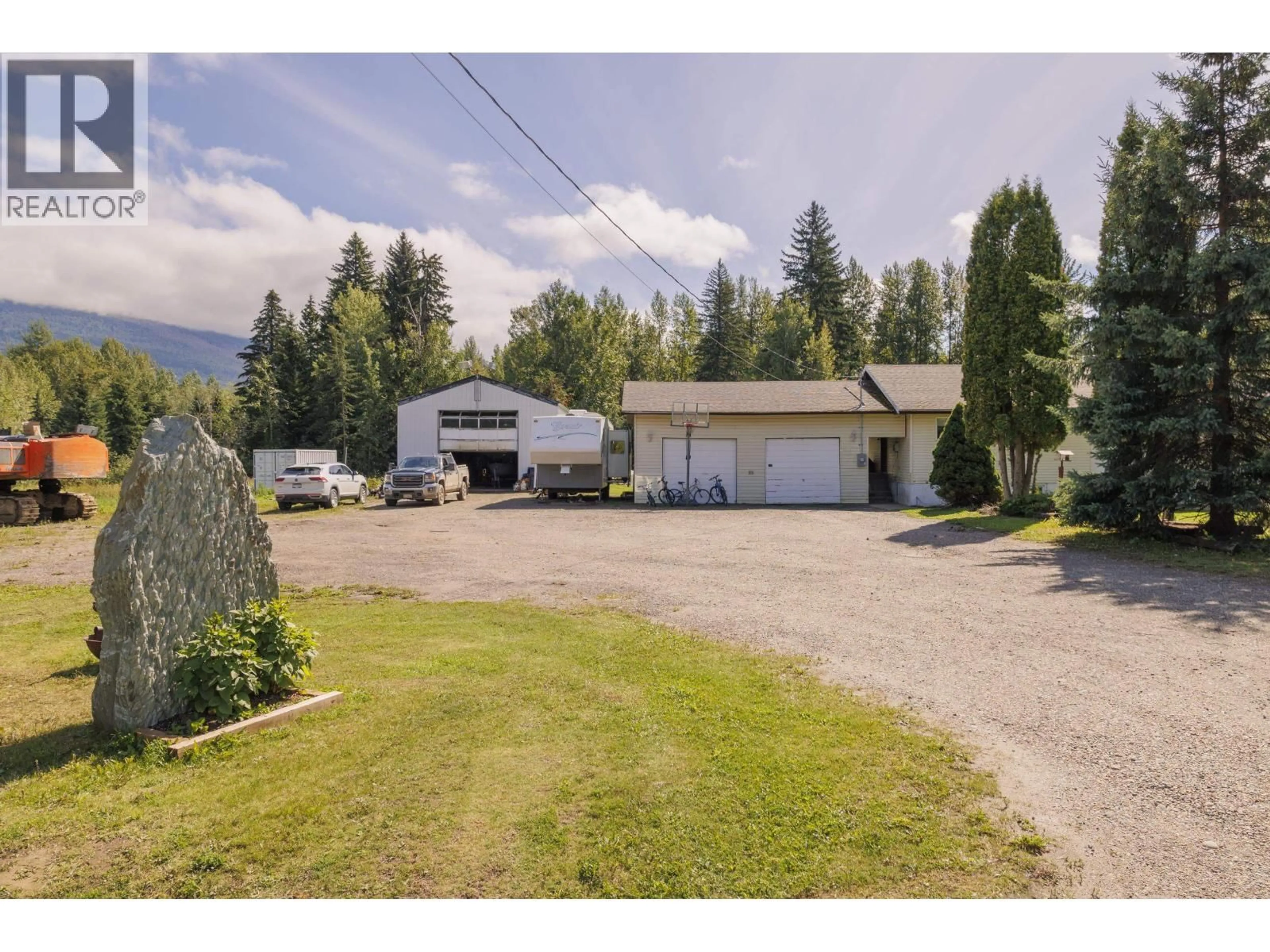 A pic from outside/outdoor area/front of a property/back of a property/a pic from drone, mountain view for 1200 DORVAL ROAD, McBride British Columbia V0J2E0
