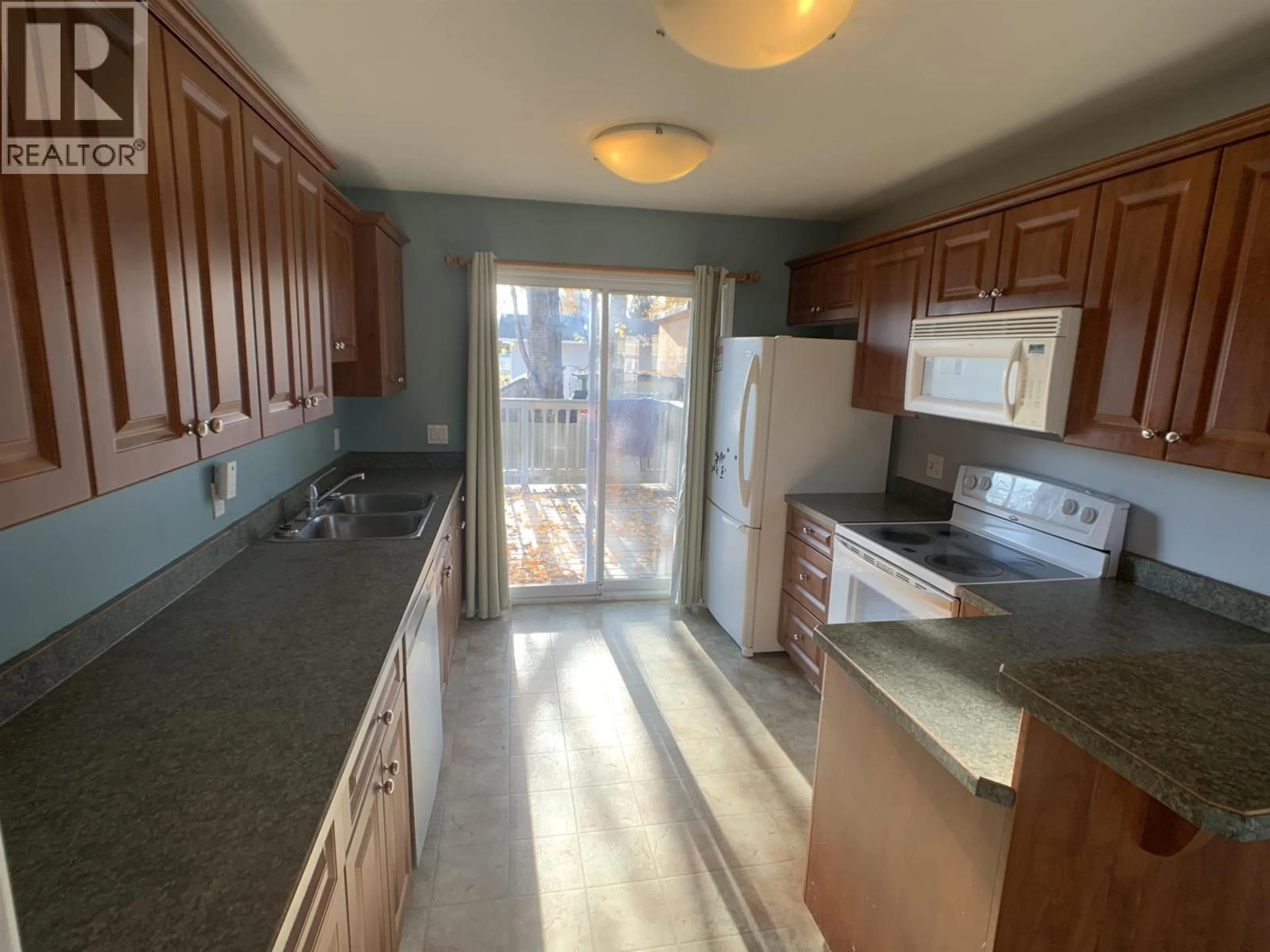 Standard kitchen, ceramic/tile floor for B - 4609 BOUNDARY ROAD, Fort Nelson British Columbia V0C1R0