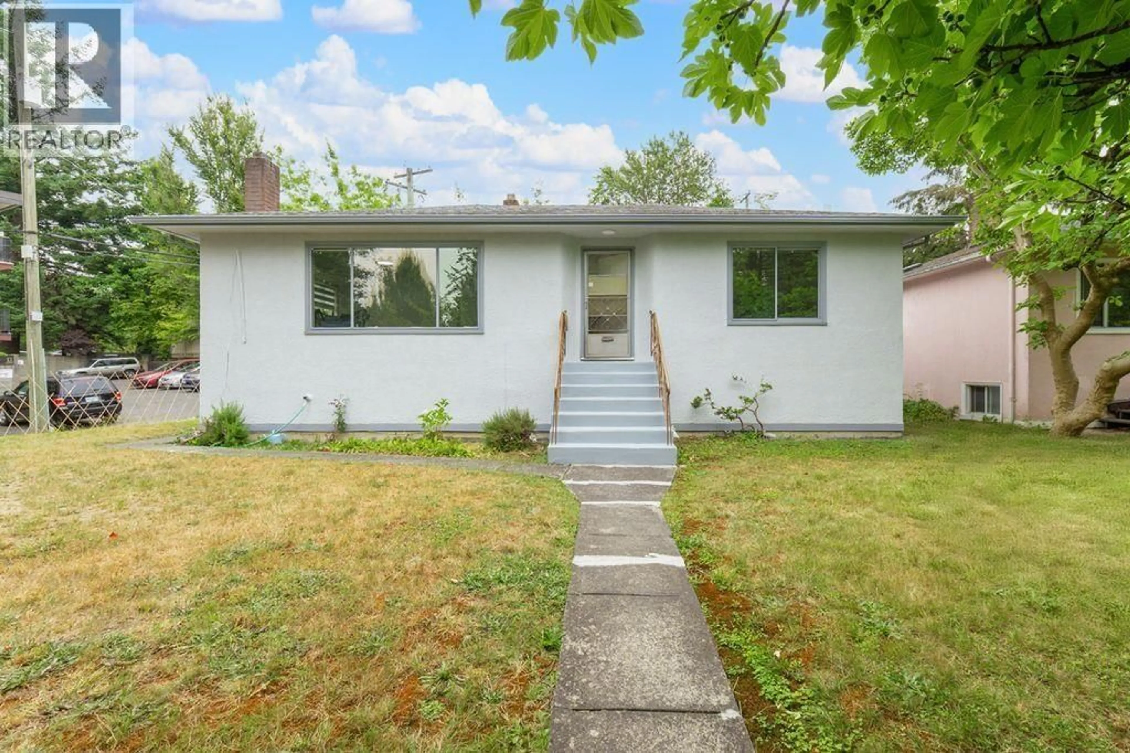 Home with vinyl exterior material, street for 3008 GARDEN DRIVE, Vancouver British Columbia V5N4X9