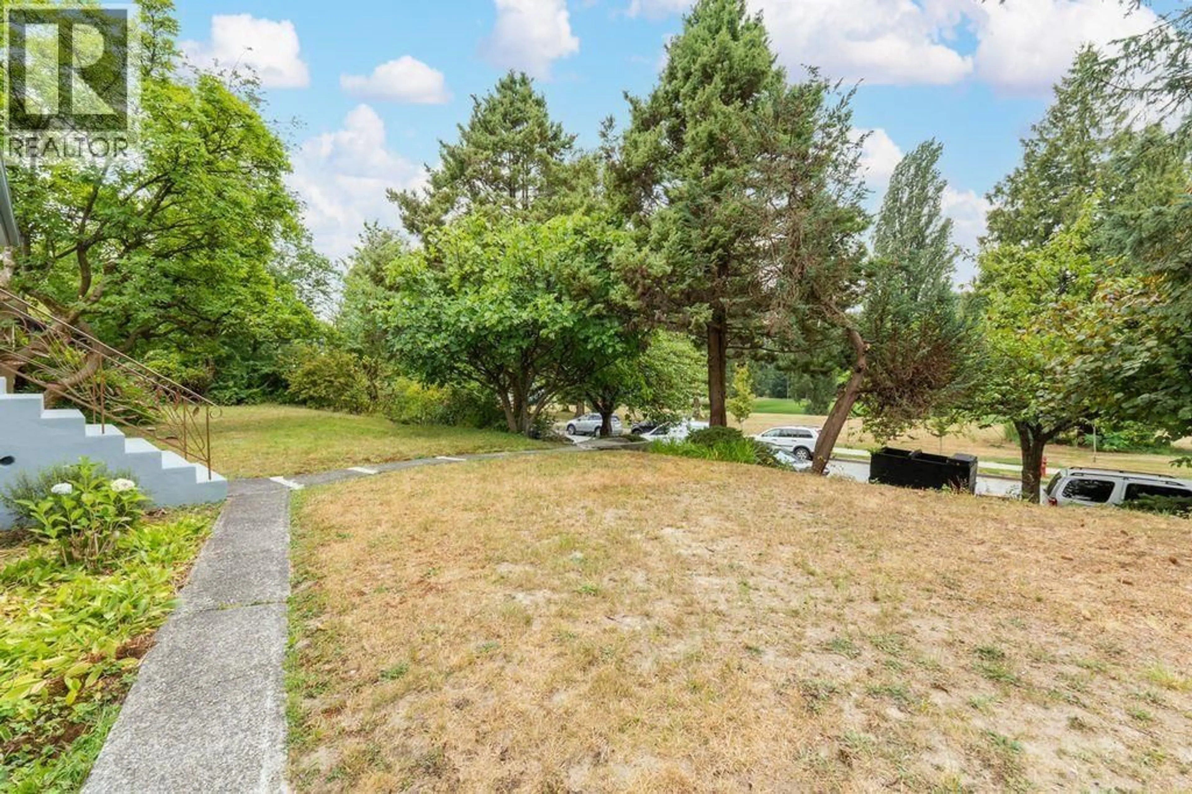 A pic from outside/outdoor area/front of a property/back of a property/a pic from drone, forest/trees view for 3008 GARDEN DRIVE, Vancouver British Columbia V5N4X9
