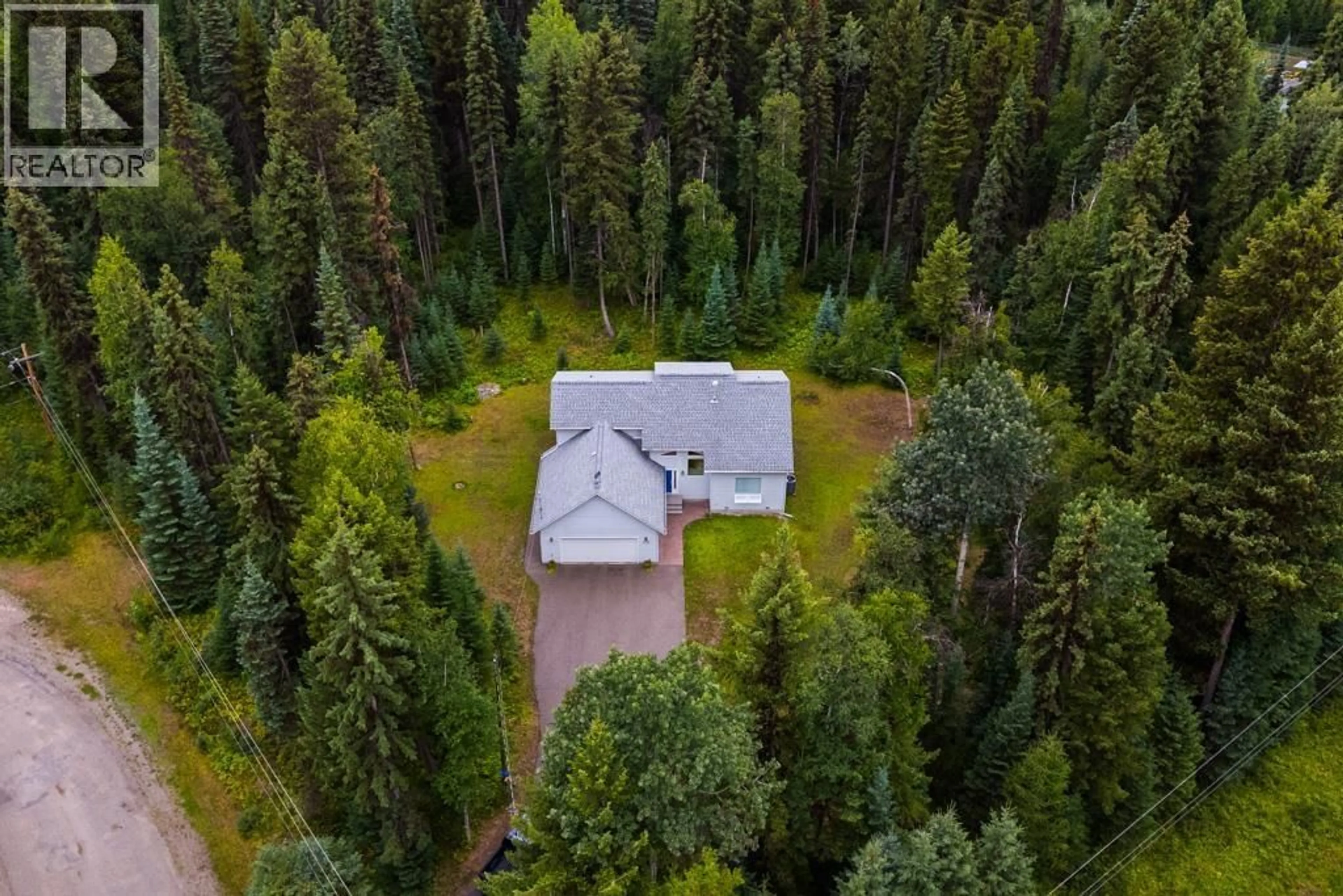 A pic from outside/outdoor area/front of a property/back of a property/a pic from drone, forest/trees view for 1095 BANKS ROAD, Prince George British Columbia V2M7C1