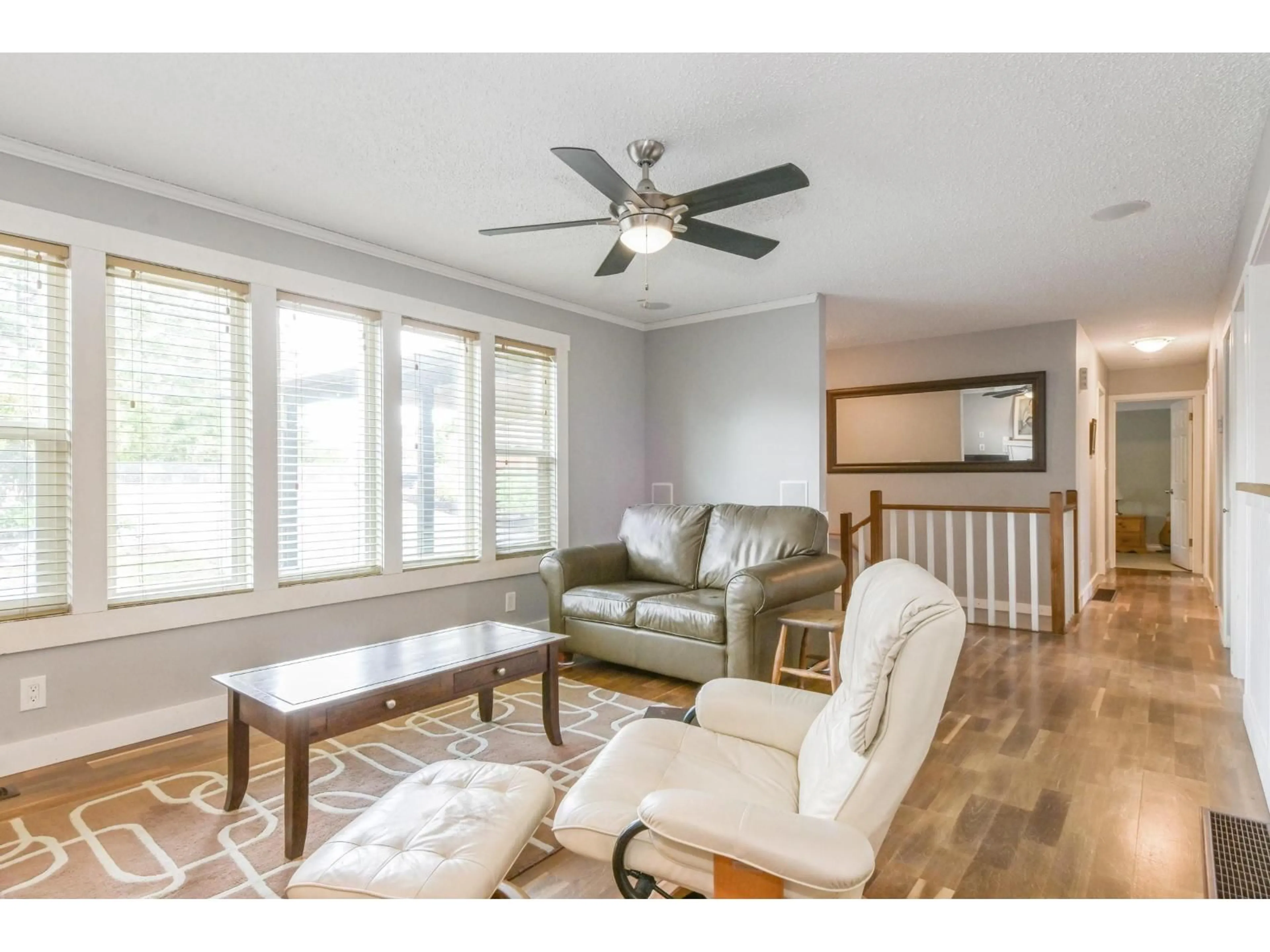 Living room with furniture, wood/laminate floor for 32584 BEST, Mission British Columbia V2V2S6