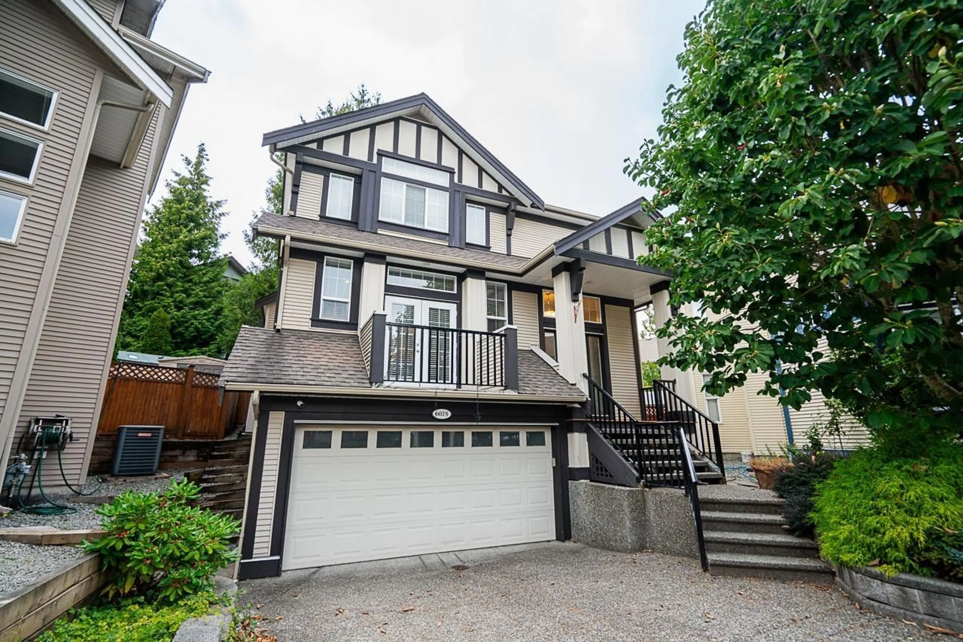 Home with vinyl exterior material, street for 6075 165A, Surrey British Columbia V3S7W6