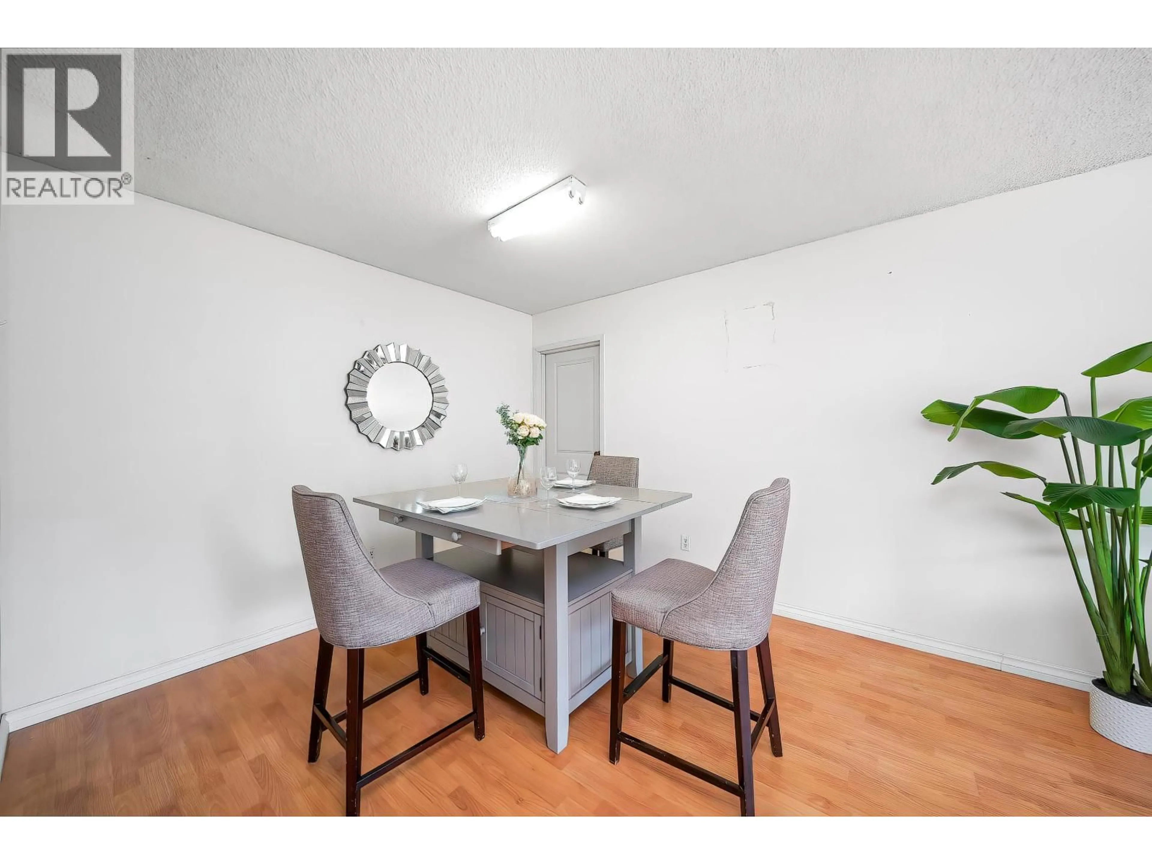 Dining room, wood/laminate floor for 211 - 8700 ACKROYD ROAD, Richmond British Columbia V6X3G2