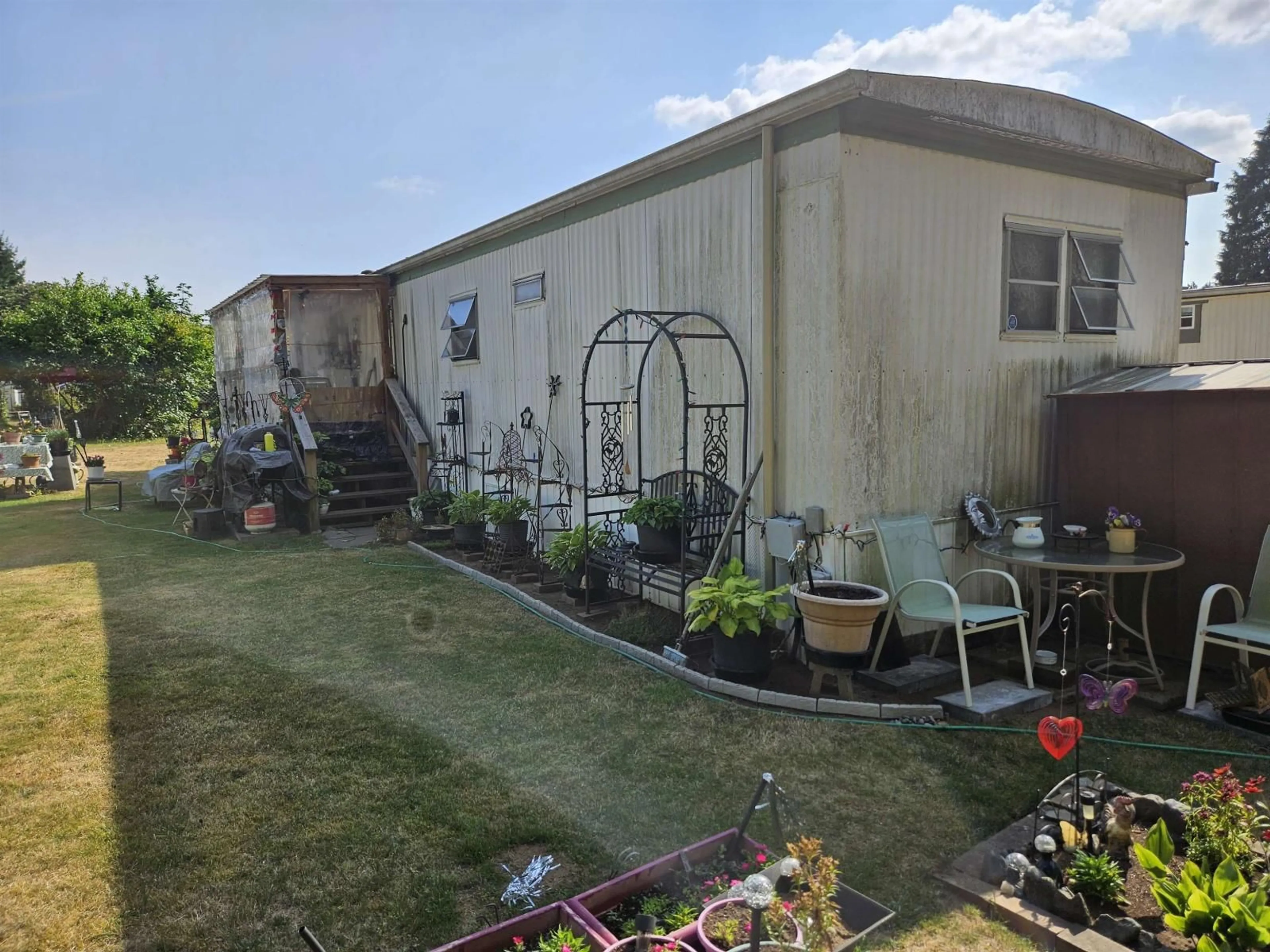 A pic from outside/outdoor area/front of a property/back of a property/a pic from drone, unknown for 24 - 4426 232, Langley British Columbia V2Z2R3